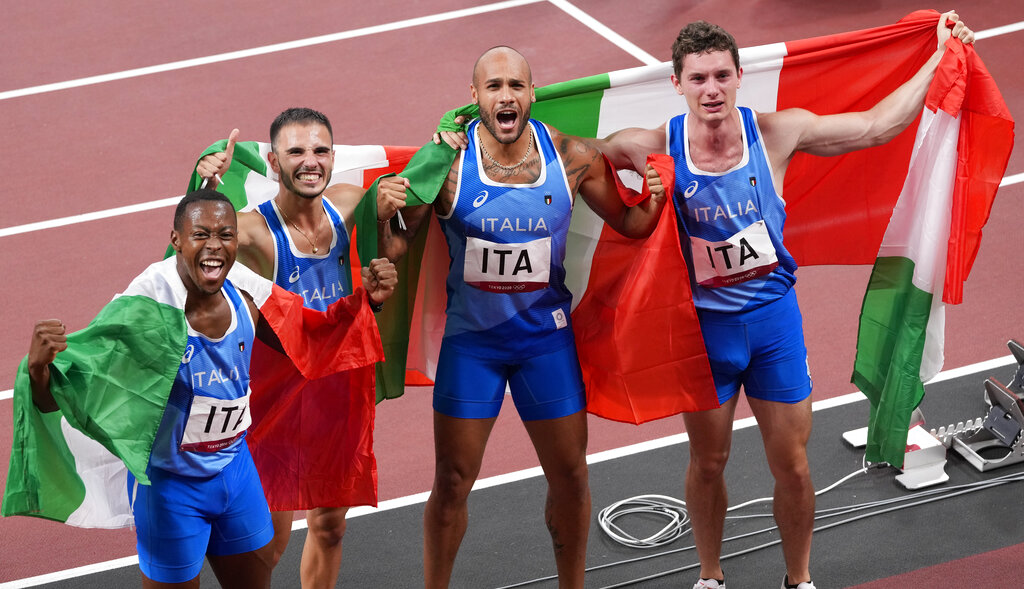 Da destra: Filippo Tortu, Lamont Jacobs Lorenzo Patta e Eseosa Desalu (AP Photo/Francisco Seco)