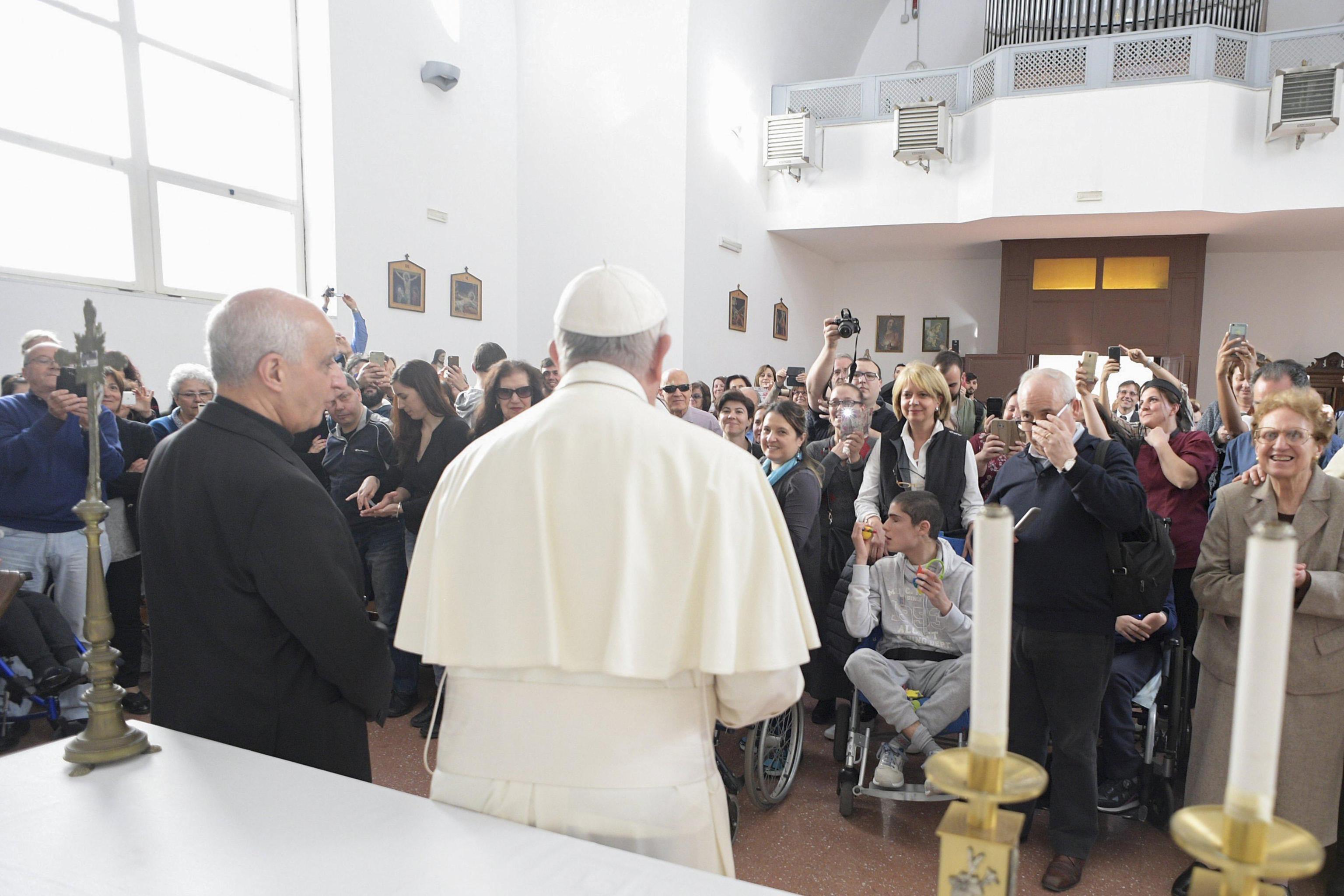 Pope Francis during his visit at the Regional Center Sant'Alessio-Margherita di Savoia, in Rome, Italy, 31 March 2017. The Institute carries out activities aimed at social inclusion of the blind and visually impaired.
ANSA/L'OSSERVATORE ROMANO
+++ ANSA PROVIDES ACCESS TO THIS HANDOUT PHOTO TO BE USED SOLELY TO ILLUSTRATE NEWS REPORTING OR COMMENTARY ON THE FACTS OR EVENTS DEPICTED IN THIS IMAGE; NO ARCHIVING; NO LICENSING +++