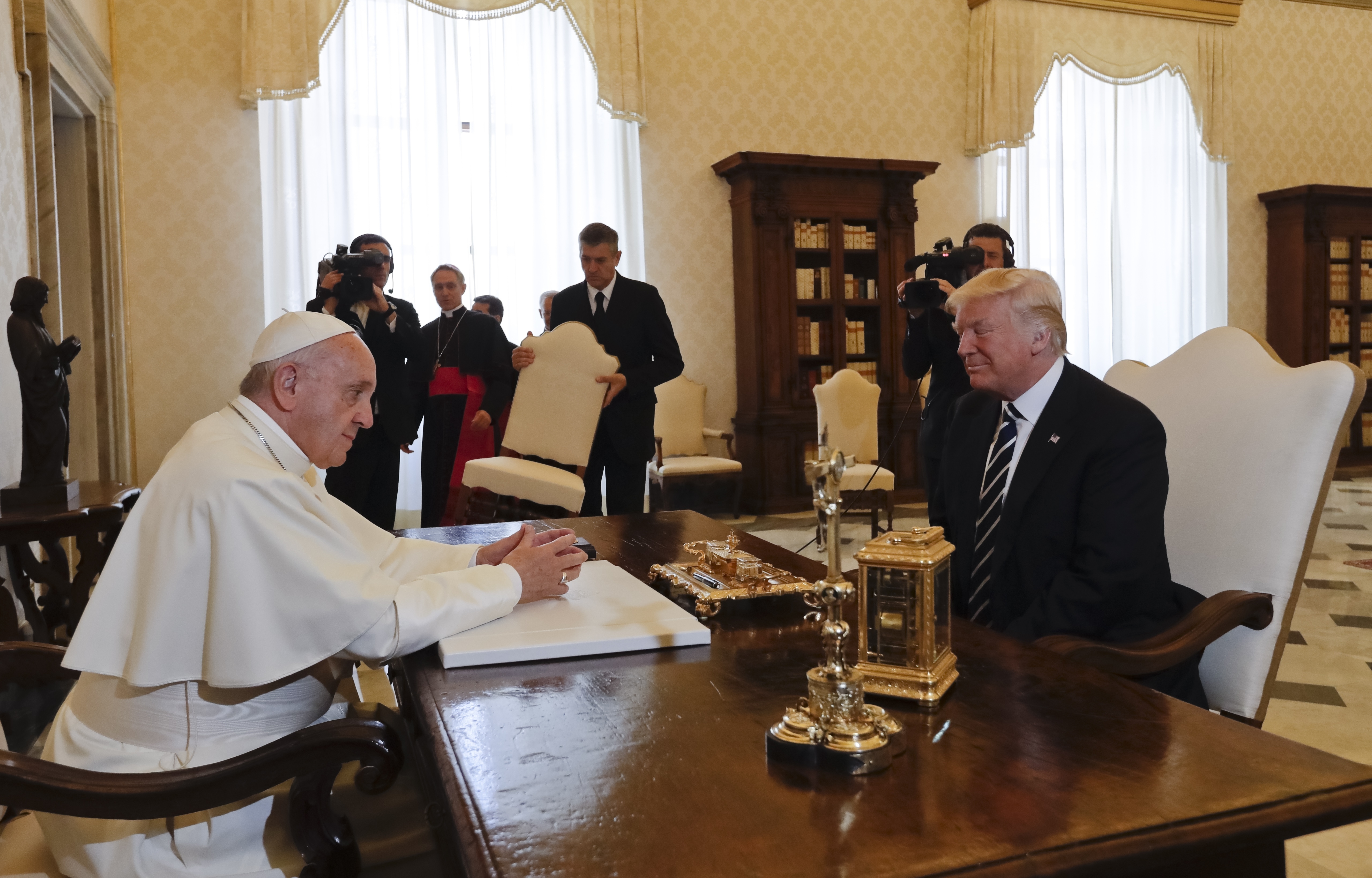 Pope Francis meets with President Donald Trump on the occasion of their private audience, at the Vatican, Wednesday, May 24, 2017. (AP Photo/Alessandra Tarantino, Pool)