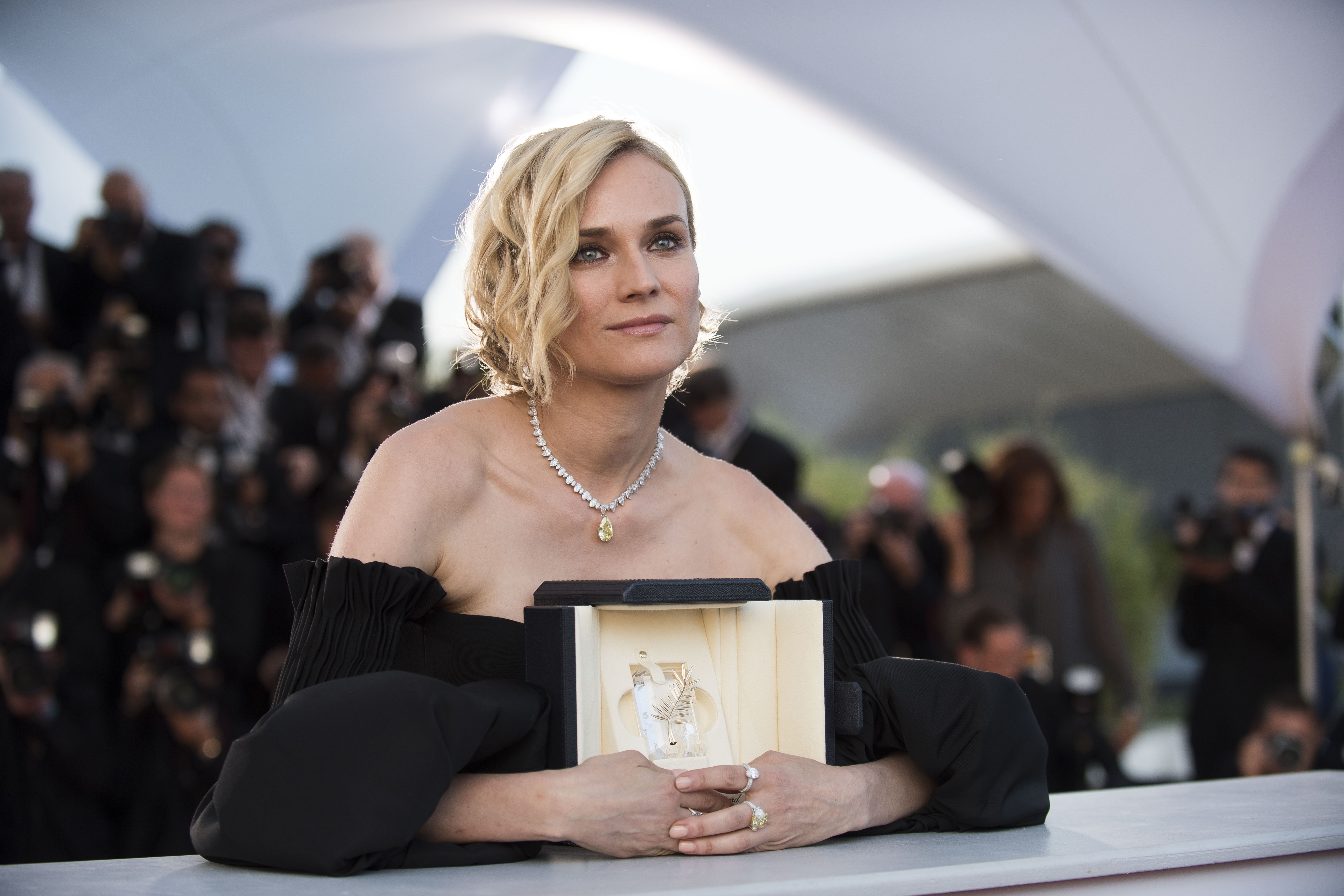Actress Diane Kruger with her Best Actress award for her role in the film In The Fade poses for photographers during a photo call following the awards ceremony at the 70th international film festival, Cannes, southern France, Sunday, May 28, 2017. (Photo by Arthur Mola/Invision/AP)