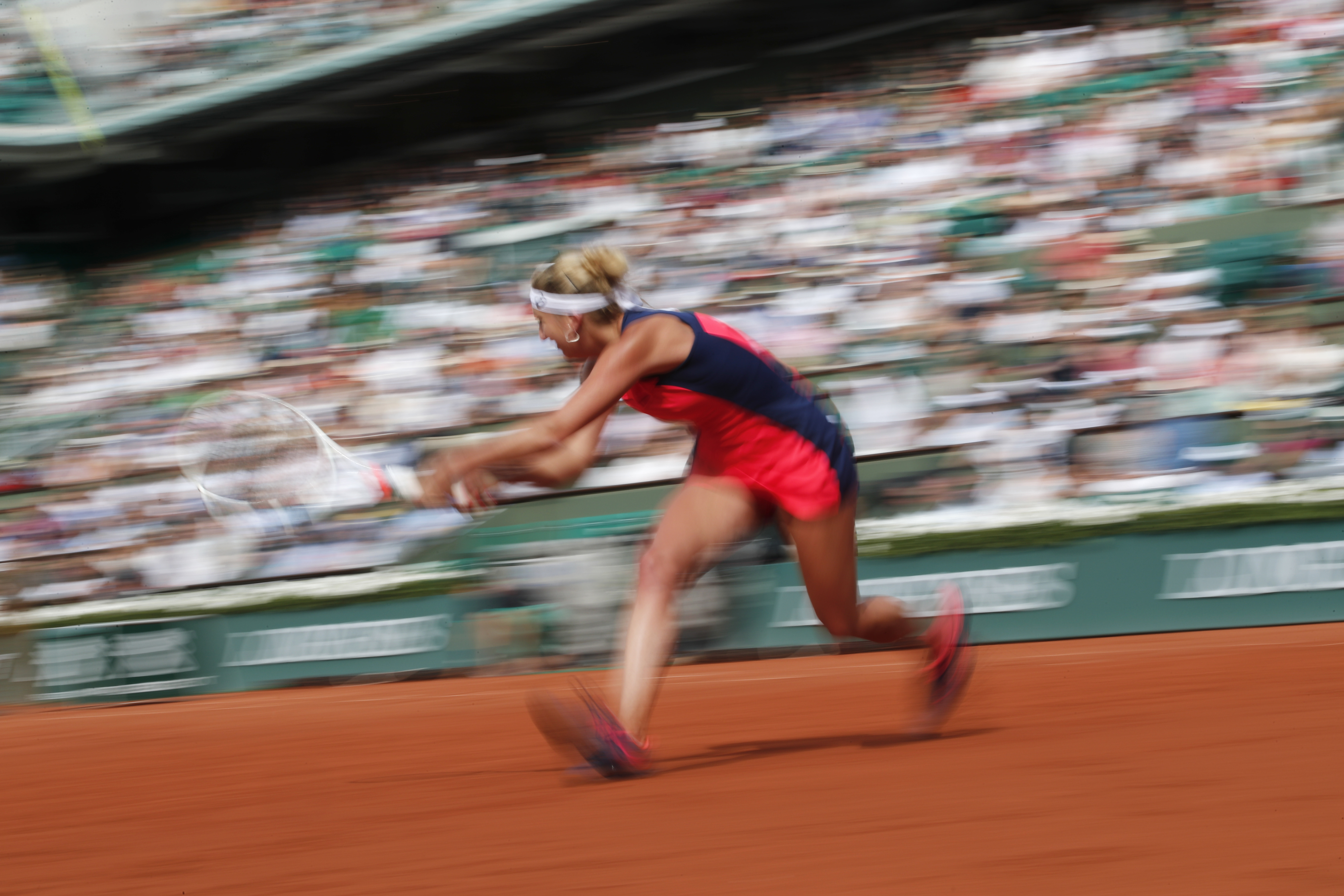 Timea Bacsinszky of Switzerland plays a shot against Venus Williams of the U.S. during their fourth round match of the French Open tennis tournament at the Roland Garros stadium, in Paris, France. Sunday, June 4, 2017. (AP Photo/Christophe Ena)
