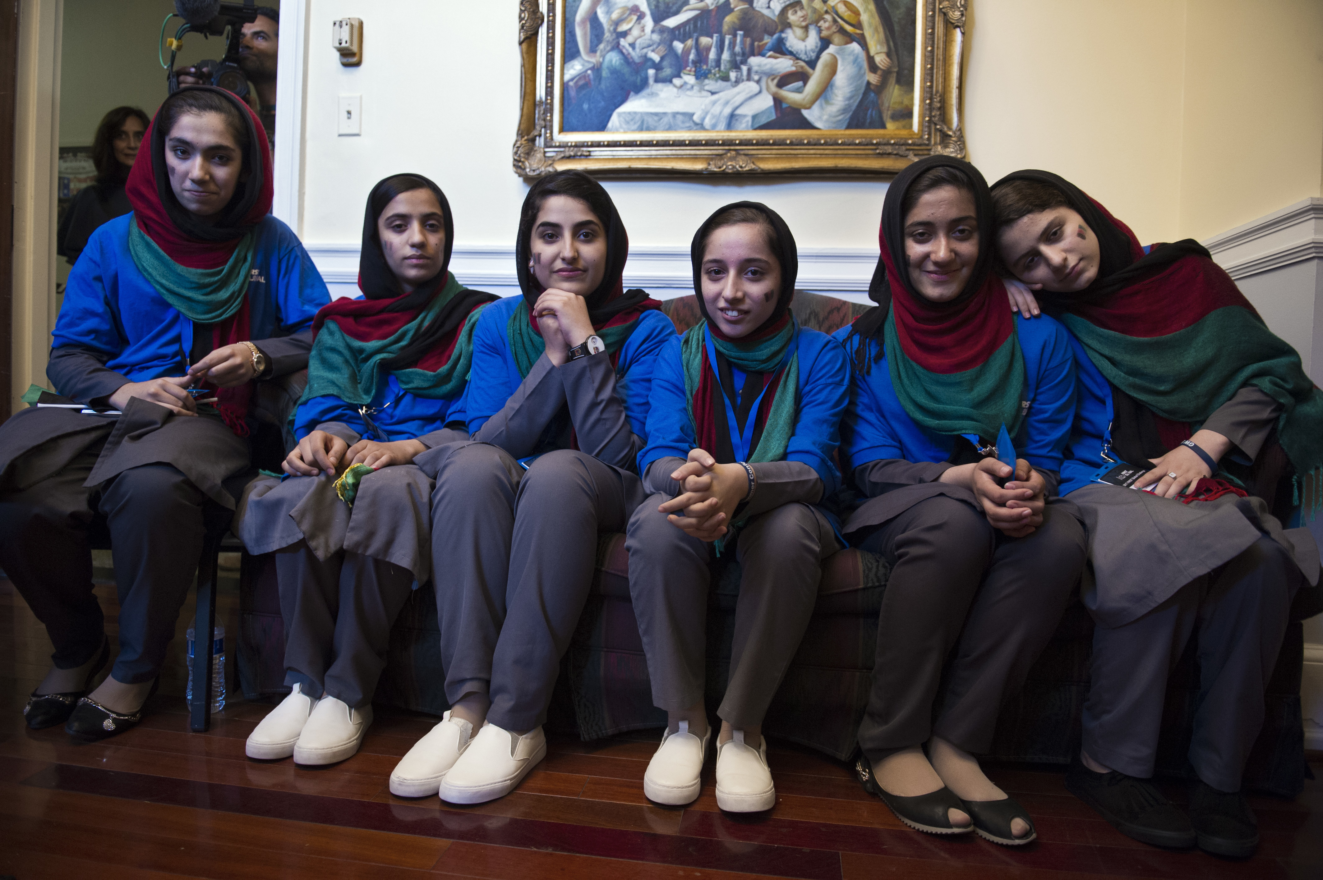 Afghanistan's FIRST Global Challenge team meet with reporters following the opening ceremony in Washington, Sunday, July 16, 2017. Twice rejected for U.S. visas, the all-girls robotics team arrived in Washington on Saturday and will compete against entrants from more than 150 countries in the three-day high school competition. It's the first annual robotics competition designed to encourage youths to pursue careers in math and science. (AP Photo/Cliff Owen)