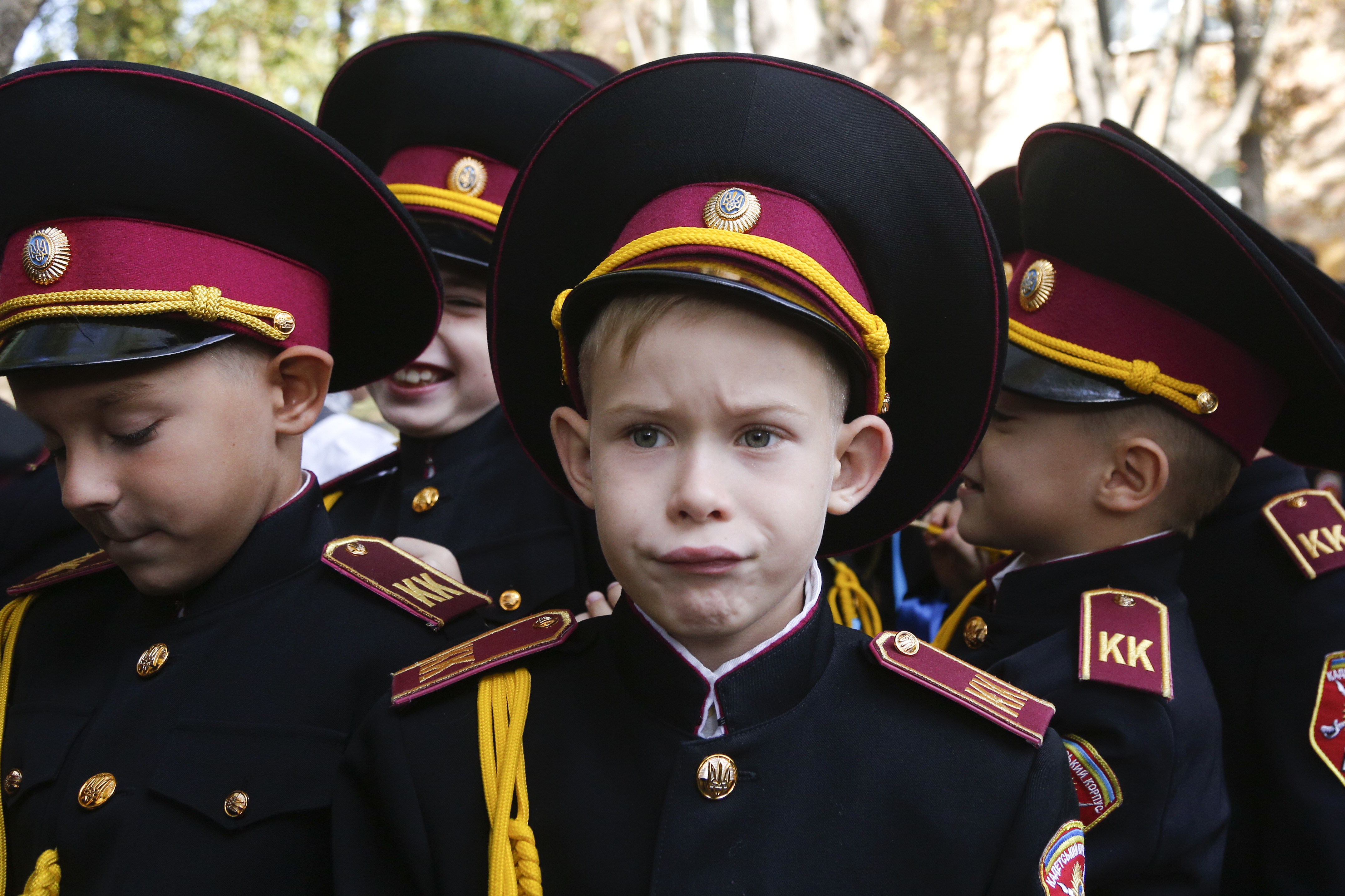 Young cadets attend a ceremony on the occasion of the first day of school at a cadet lyceum in Kiev, Ukraine, Friday, Sept. 1, 2017. Ukraine marks Sept. 1 as Knowledge Day, as a traditional launch of the academic year. (AP Photo/Efrem Lukatsky)