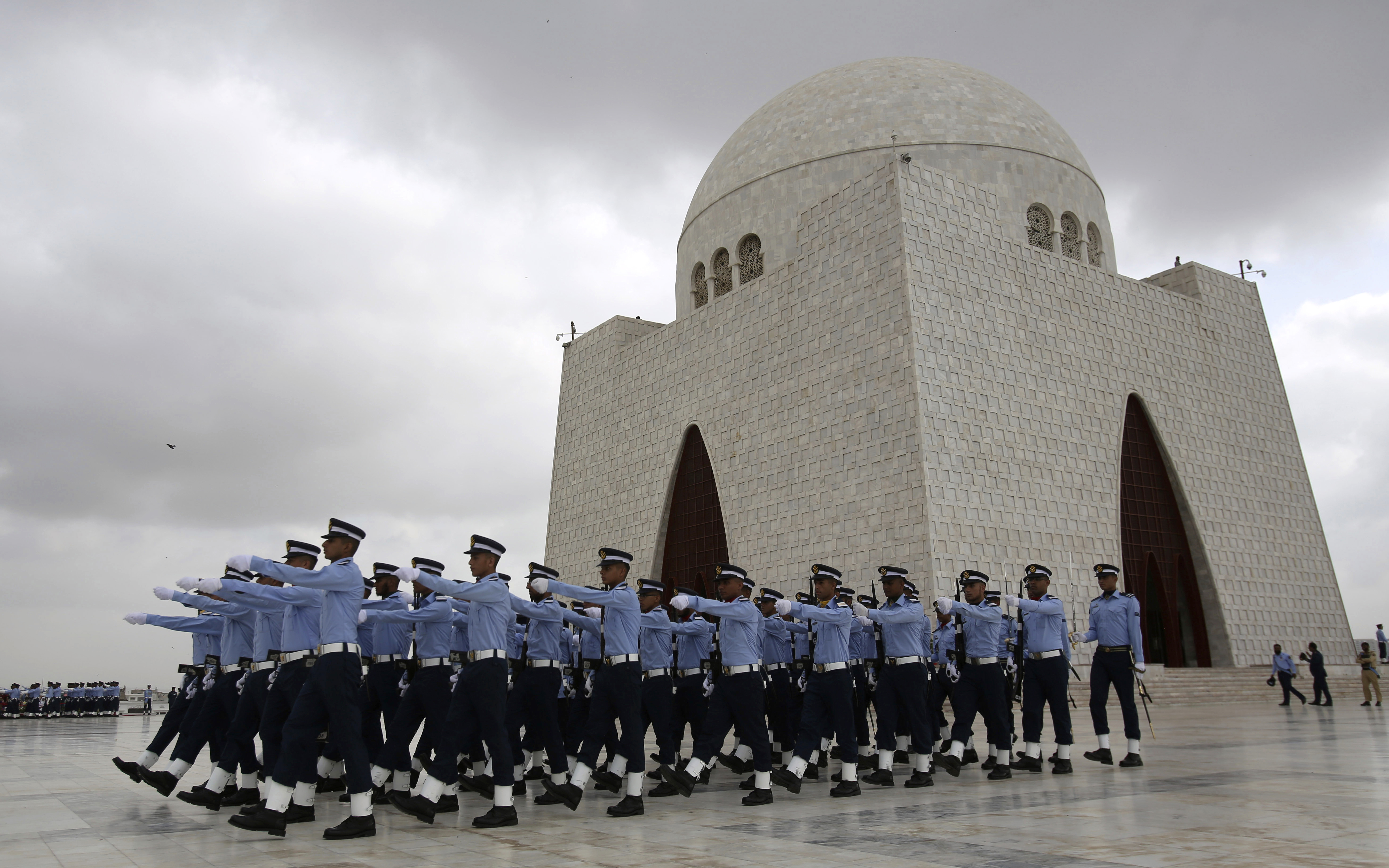 Pakistani Air Force personnel take part in a ceremony to mark Pakistan Defense Day at the Mausoleum of Mohammad Ali Jinnah, founder of Pakistan, in Karachi, Pakistan, Wednesday, Sept. 6, 2017. Pakistan celebrated its Defense Day marking the 1965 war with India over the disputed Kashmir region. (AP Photo/Fareed Khan)