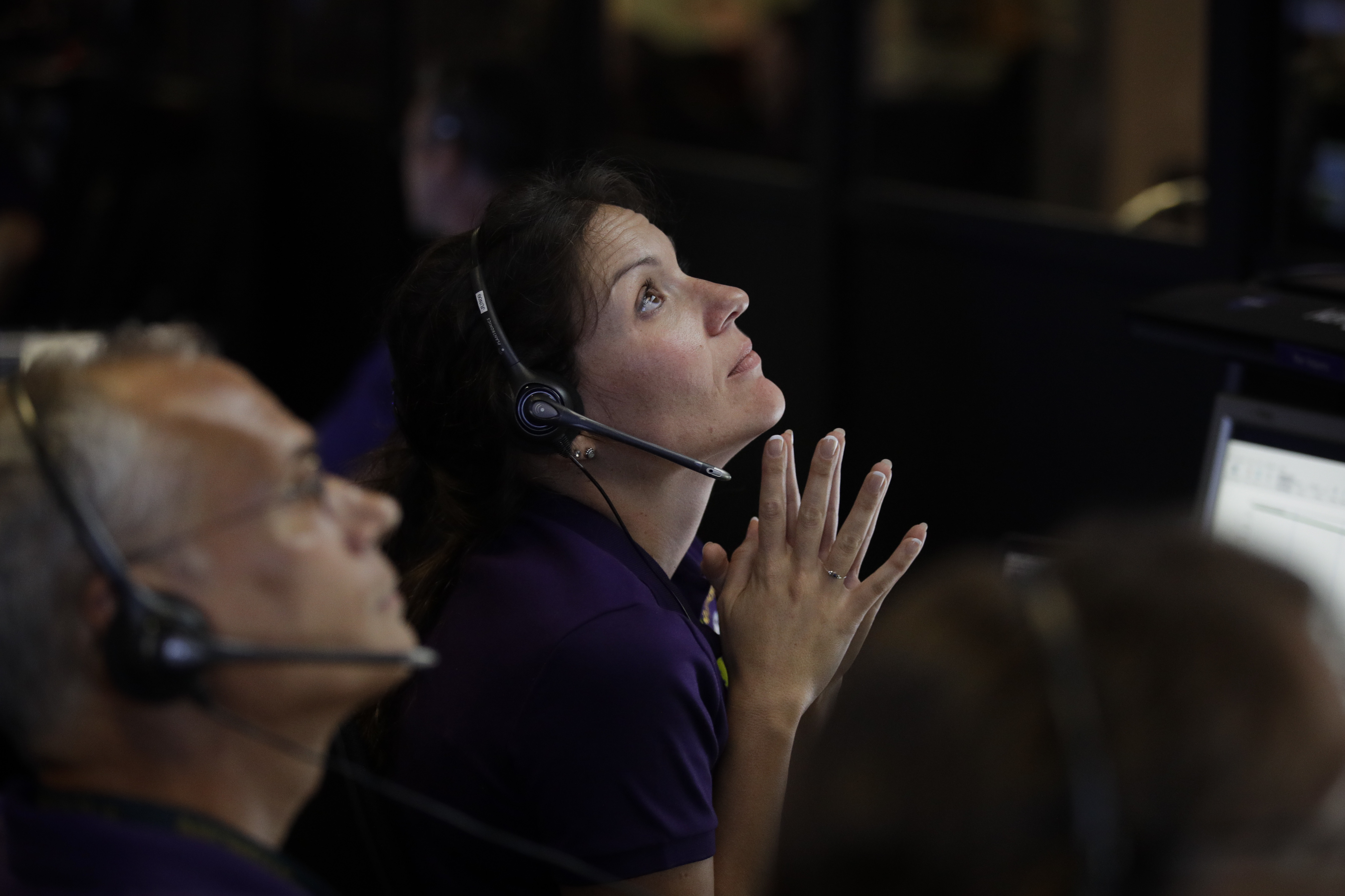 Engineer Mar Vaquero monitors the status of NASA's Cassini spacecraft as it enters the atmosphere of Saturn in mission control at NASA's Jet Propulsion Laboratory, Friday, Sept. 15, 2017, in Pasadena, Calif. Cassini disintegrated in the skies above Saturn early Friday, following a remarkable journey of 20 years. (AP Photo/Jae C. Hong, Pool)