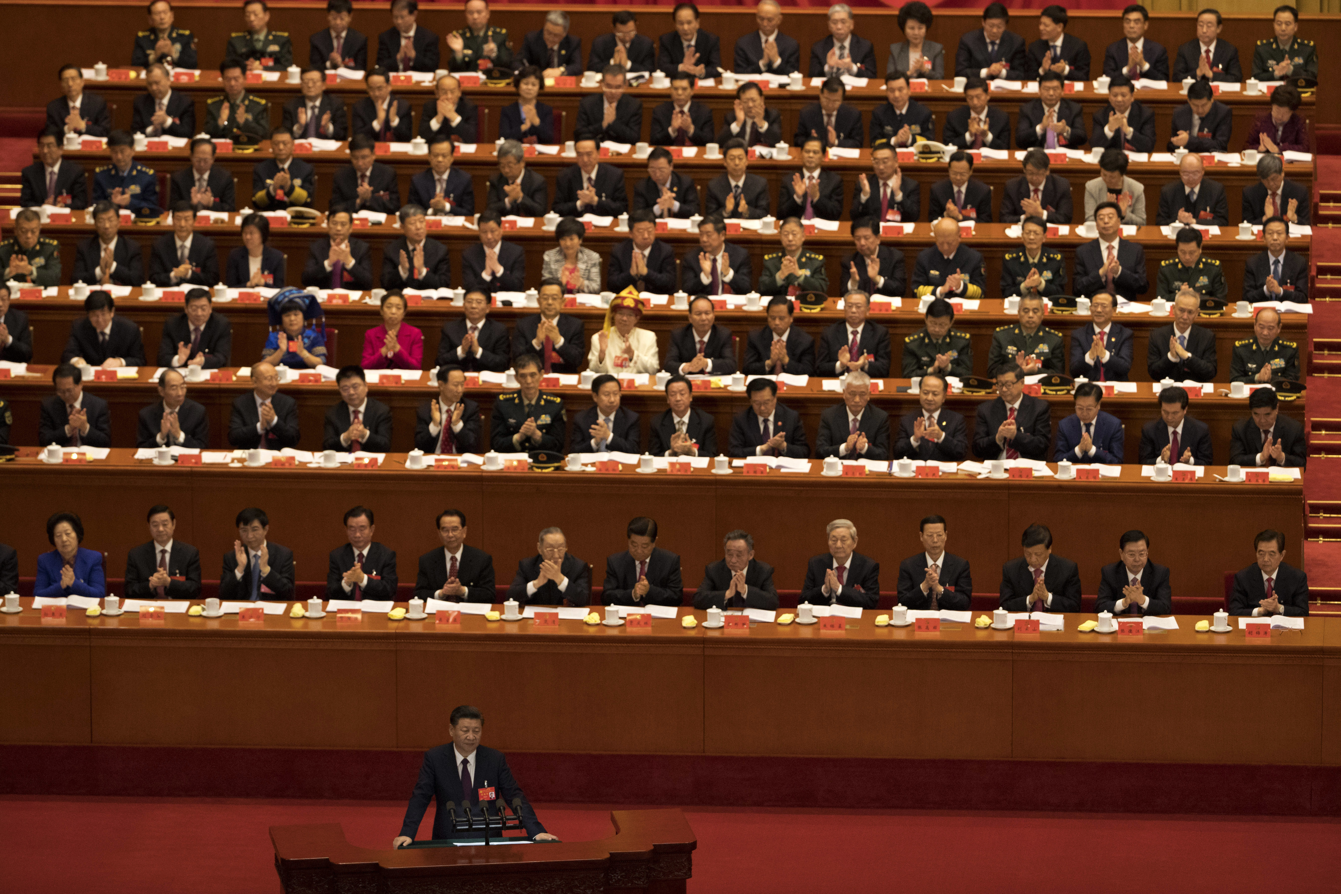 Chinese President Xi Jinping delivers a speech at the opening ceremony of the 19th Party Congress held at the Great Hall of the People in Beijing, China, Wednesday, Oct. 18, 2017. Chinese President Xi Jinping on Wednesday urged a reinvigorated Communist Party to take on a more forceful role in society and economic development to better address 