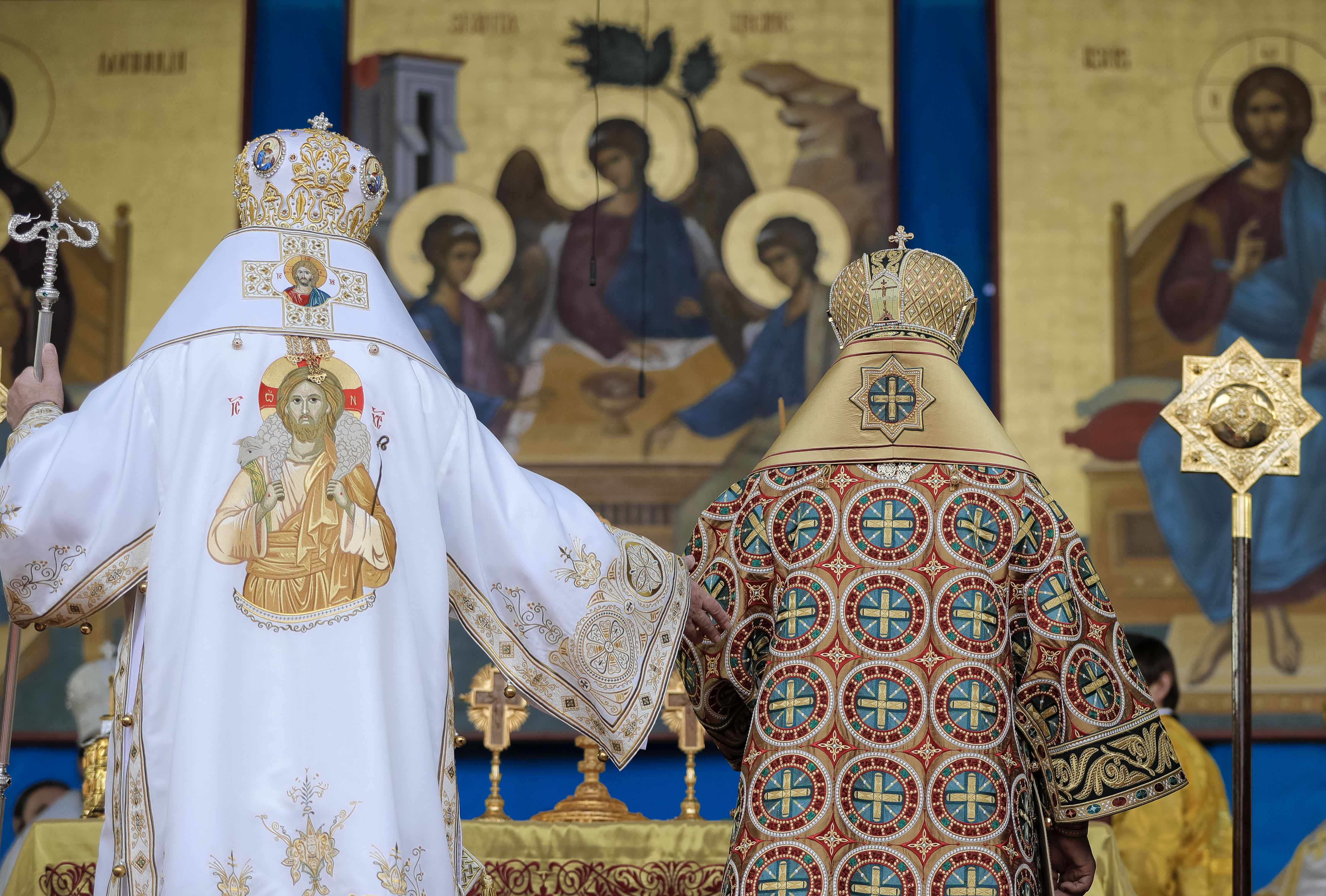 The head of the Russian Orthodox Church Patriarch Kirill Patriarch, right, walks with Patriarch Daniel, the head of the Romanian Orthodox Church during a religious service in Bucharest, Romania, Friday, Oct. 27, 2017. Russian Orthodox patriarch of Moscow Kirill is in Romania in the first visit by the head of the powerful Russian church since communism ended.(AP Photo/Vadim Ghirda)