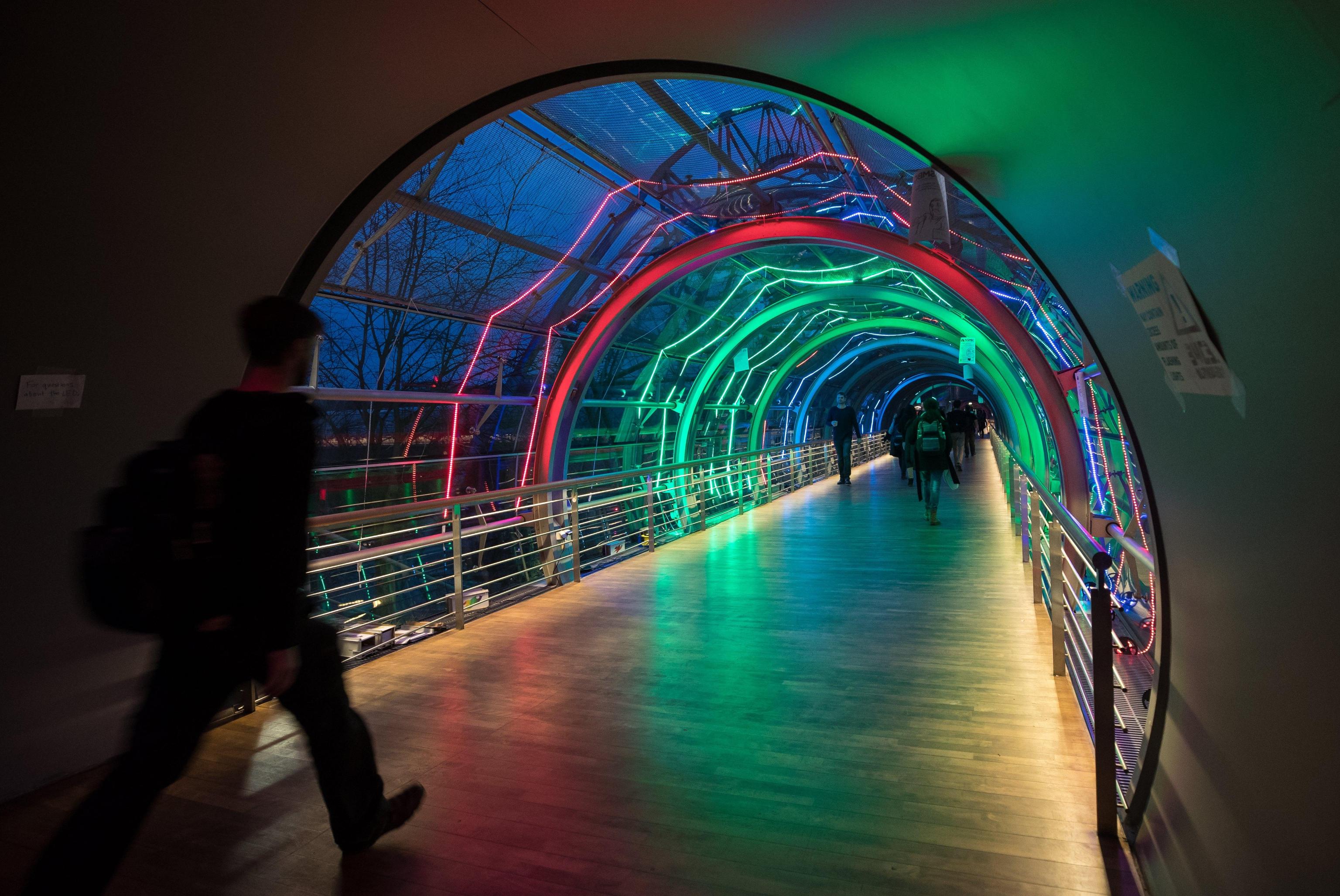 Visitors pass through a tunnel at the Chaos Communication Congress (CCC) in Leipzig, Germany, 27 December 2017. The world's largest non-commercial hacker meeting takes place until 30 December 2017.  EPA/HAYOUNG JEON