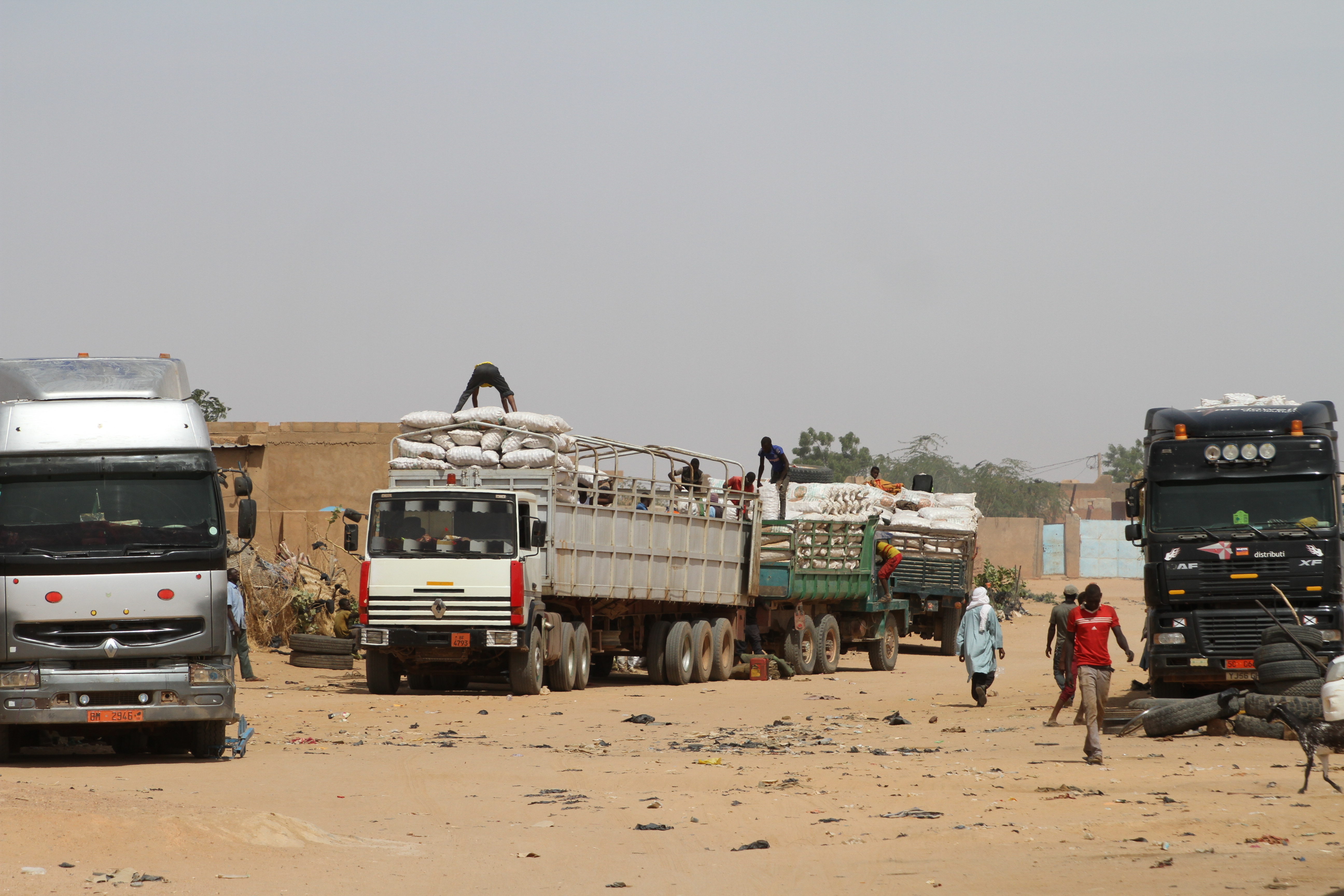 Trucks are prepared for transport through the Sahara in Agadez, Niger, 26 October 2017. Migrants were allowed to travel through the desert to Libya until 2015. Photo by: Kristin Palitza/picture-alliance/dpa/AP Images