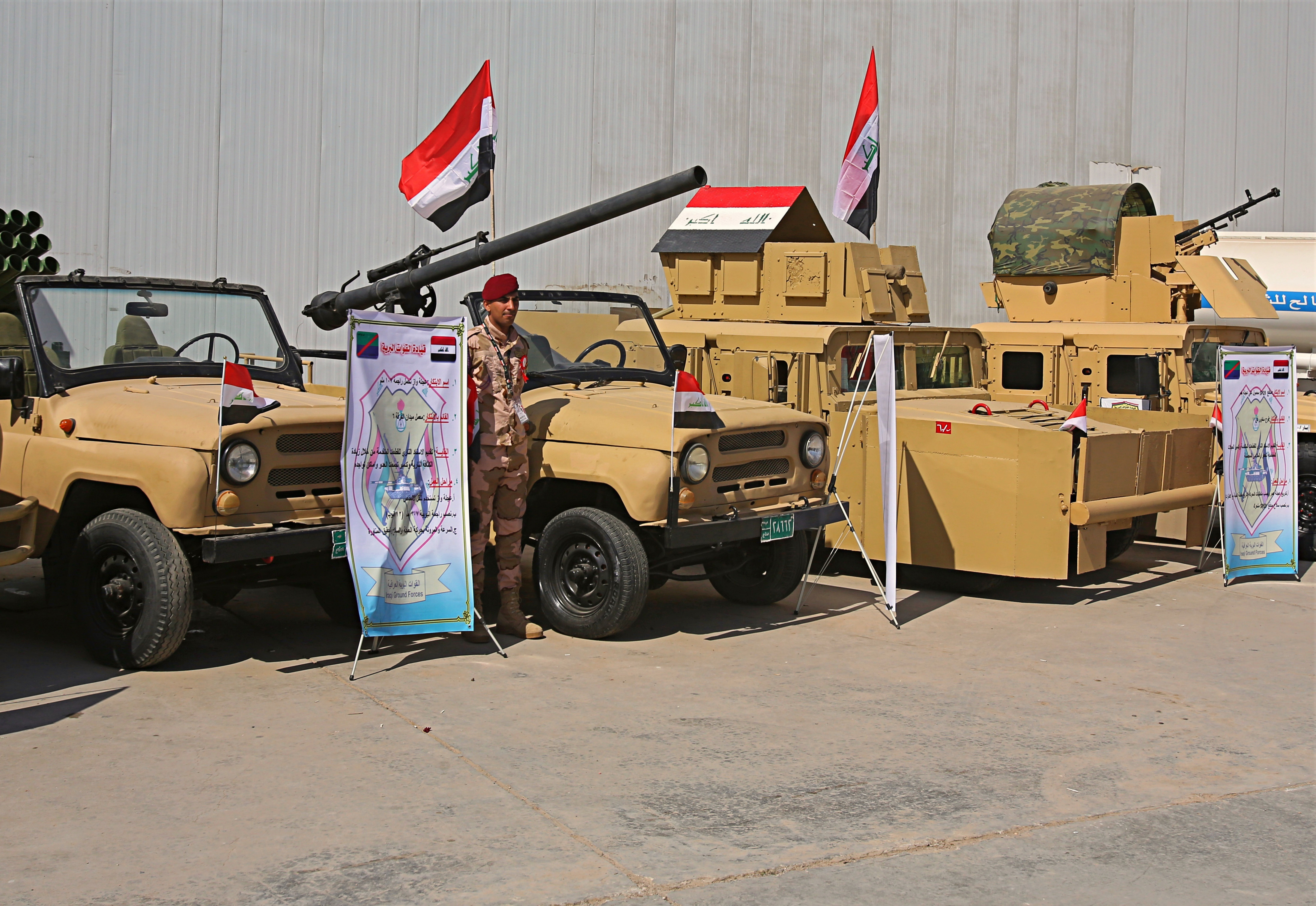 Iraqi military vehicles are on display during the seventh annual weapons exhibition organized by the Iraqi ministry of defense, at the Baghdad International Fairgrounds, Sunday, March, 11, 2018. (AP Photo/Karim Kadim)