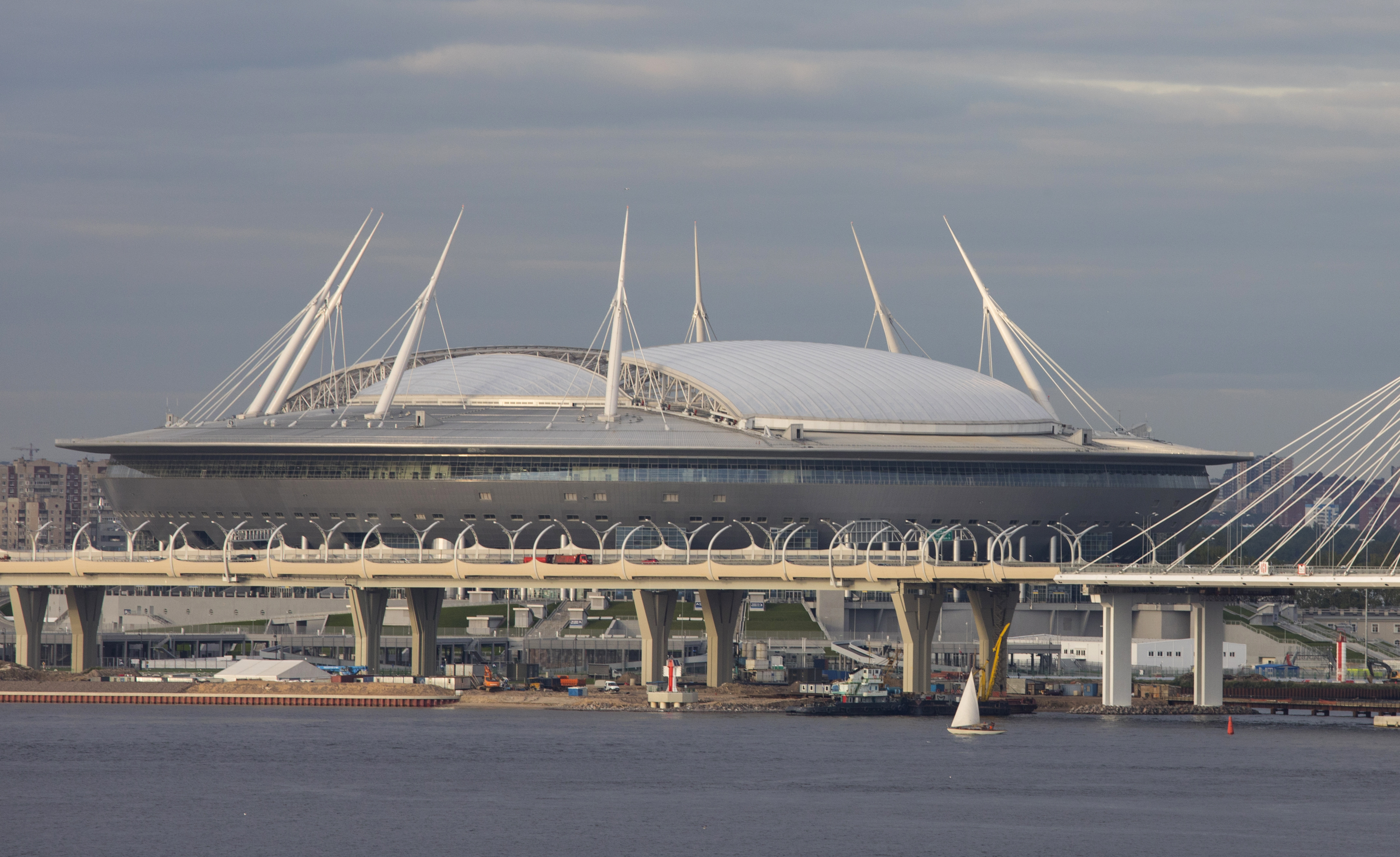 The Krestovsky Stadium is viewed looking from the Gulf of Finland in St. Petersburg, Russia, on Aug. 28, 2017. The soccer stadium has a retractable roof and is in the western part of Krestosky Island in St. Petersburg near the Gulf of Finland. The stadium will be know as Saint Petersburg Stadium during the 2018 FIFA World Cup. The stadium is near the new Gazprom headquarters. (AP Photo/Jon Elswick)