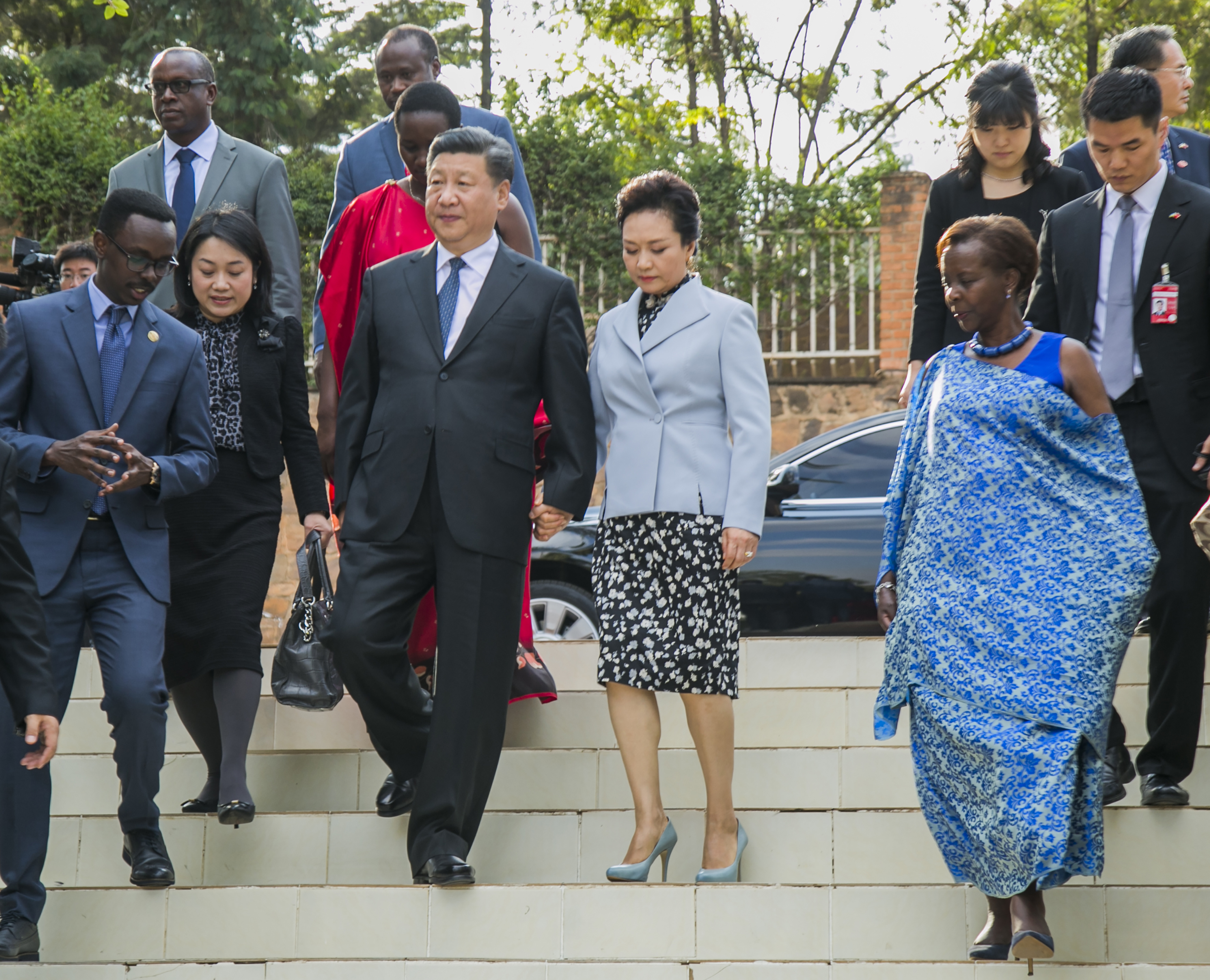 Chinese President Xi Jinping and his wife Peng Liyuan accompanied by Rwanda's Minister of Foreigh Affairs Louise Mushikiwabo, far right, arrive at the Kigali Memorial Center on Monday,July 23, 2018 as part of his two day state visit to Rwanda. Xi is the first Chinese president to visit Rwanda.
(AP Photo)