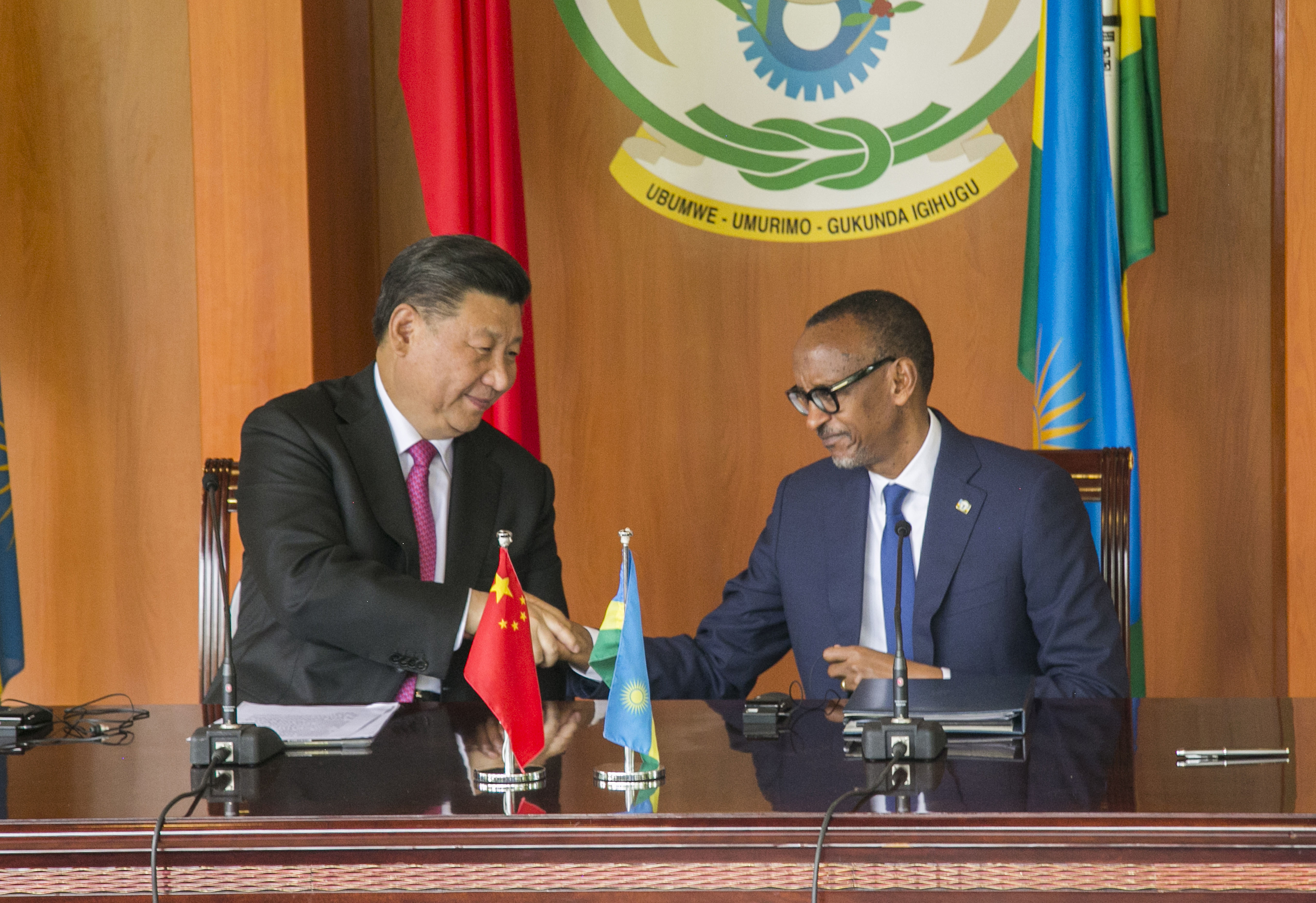 China's President Xi Jinping, left, shakes hands with Rwanda's President Paul Kagame during a press conference at State House, in Kigali, Rwanda, Monday, July 23, 2018. Kagame is praising China’s treatment of Africa “as an equal,” calling it “a revolutionary posture in world affairs.” (AP Photo)