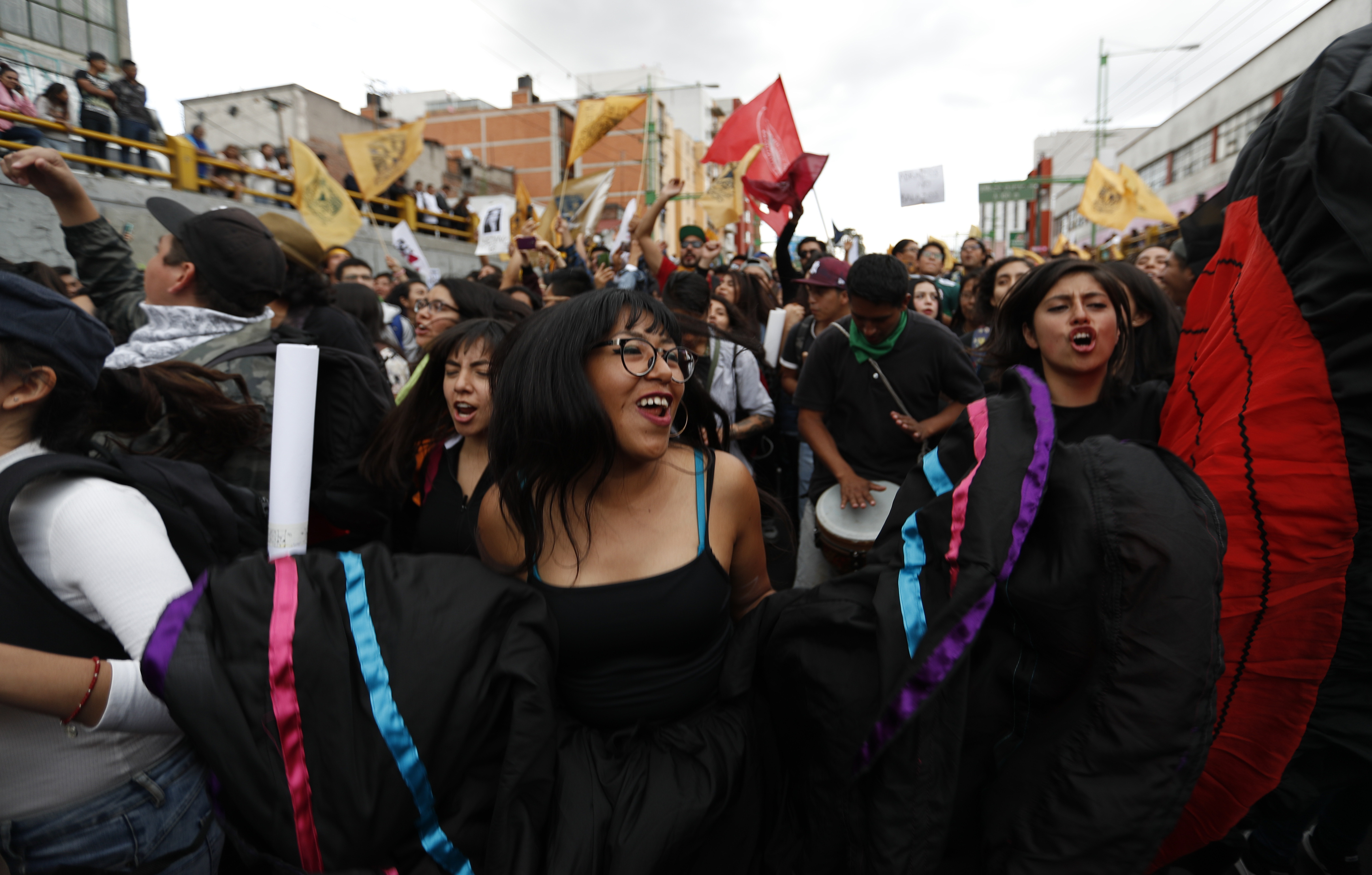 Demonstrators march in remembrance of the 1968 Tlatelolco student massacre in Mexico City, Tuesday, Oct. 2, 2018. Mexico is marking the massacre of student protesters by army troops 50 years ago. (AP Photo/Eduardo Verdugo)