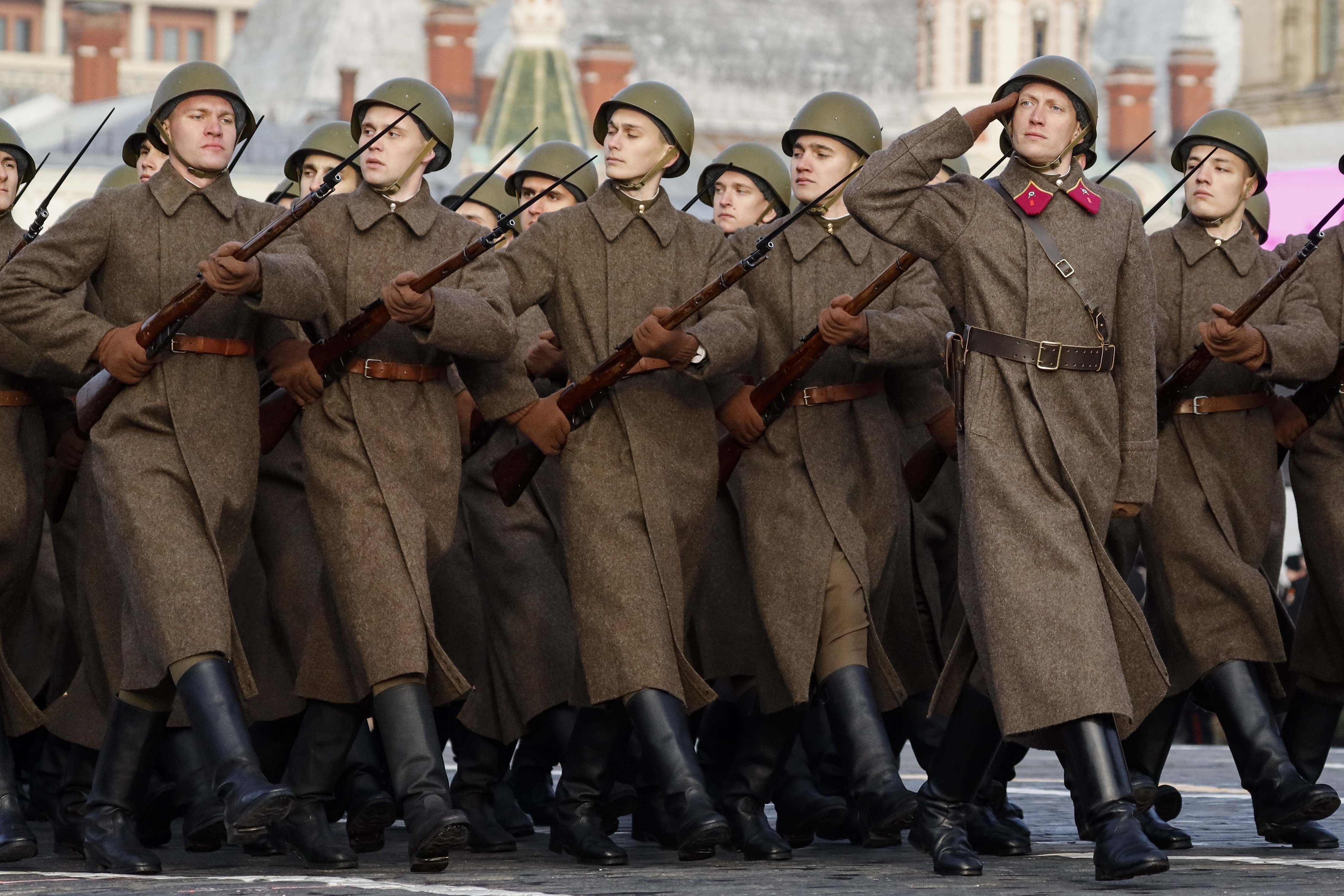 Russian soldiers dressed in Red Army World War II uniform march during the Nov. 7 parade in Red Square, in Moscow, Russia, Wednesday, Nov. 7, 2018. The event marked the 77th anniversary of a World War II historic parade in Red Square and honored the participants in the Nov. 7, 1941 parade who headed directly to the front lines to defend Moscow from the Nazi forces. (AP Photo/Alexander Zemlianichenko)