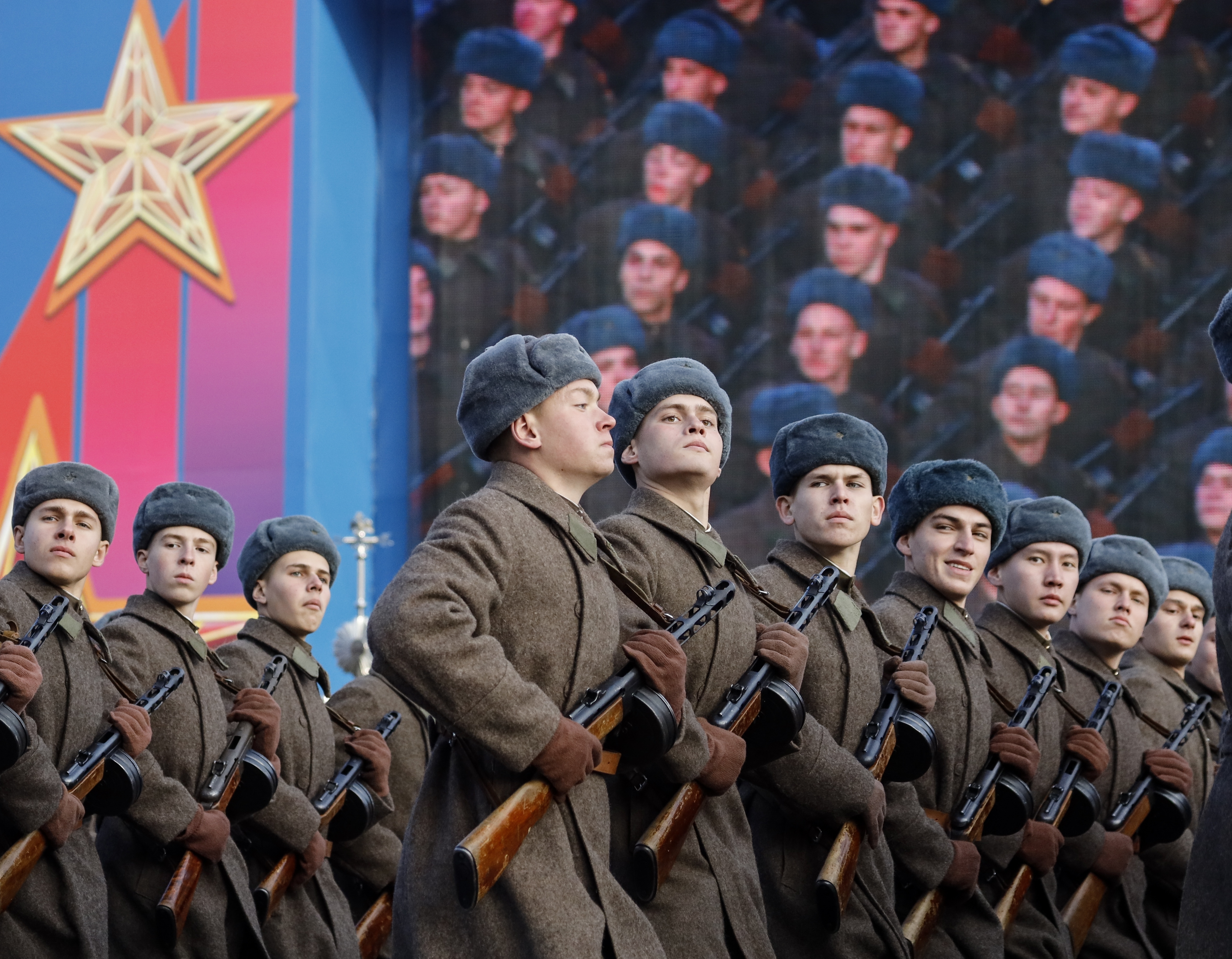 Russian soldiers dressed in Red Army World War II uniforms march during the Nov. 7 parade in Red Square, in Moscow, Russia, Wednesday, Nov. 7, 2018. The event marked the 77th anniversary of a World War II historic parade in Red Square and honored the participants in the Nov. 7, 1941 parade who headed directly to the front lines to defend Moscow from the Nazi forces. (AP Photo/Alexander Zemlianichenko)
