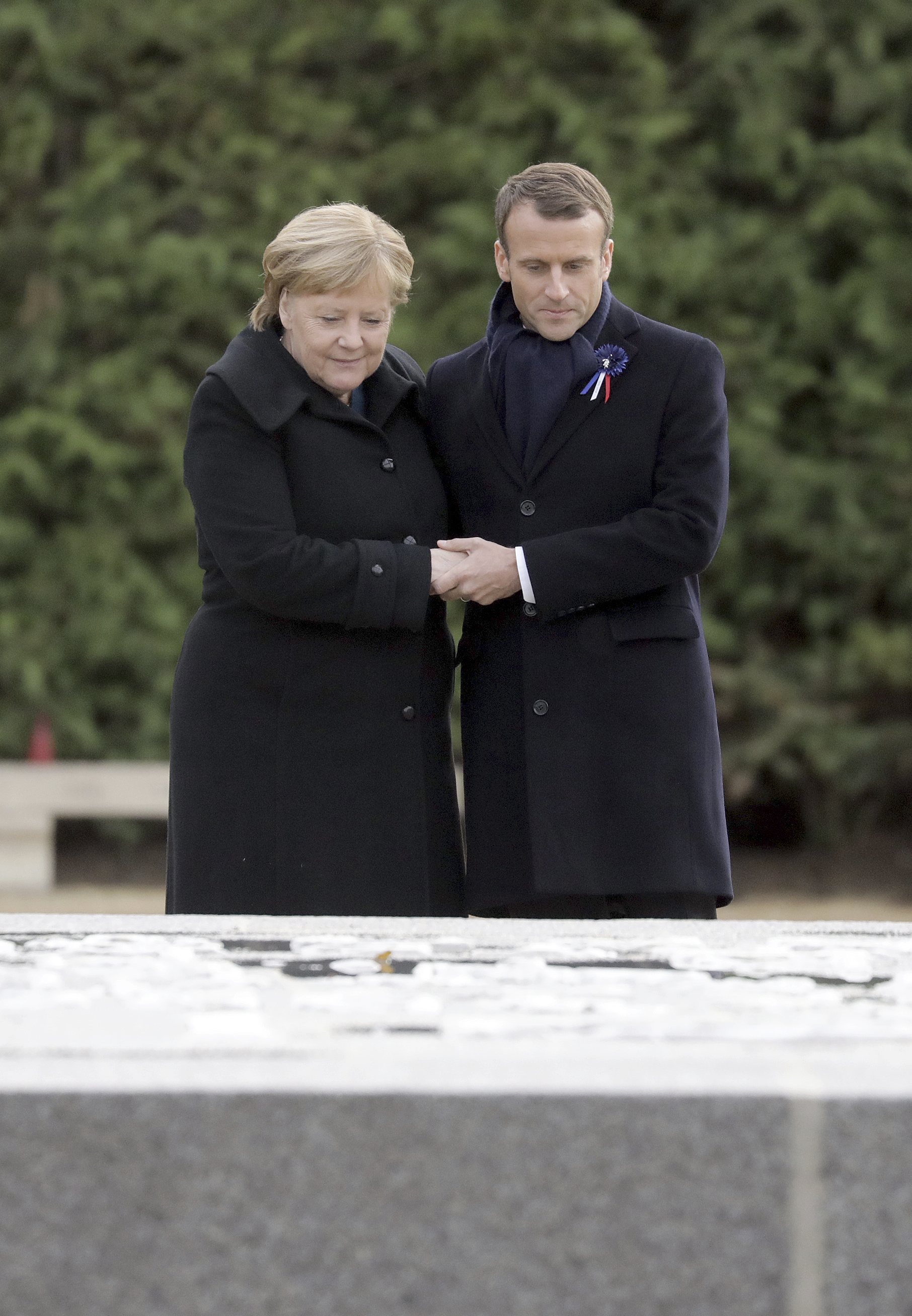 10 November 2018, France, Compiegne: German Chancellor Angela Merkel (CDU) and French President Emmanuel Macron commemorate the end of the First World War 100 years ago near the northern French town of Compi'gne. The armistice was signed on 11 November 1918 in a converted dining car in the clearing. The memorial is located on this site. Photo by: Kay Nietfeld/picture-alliance/dpa/AP Images
