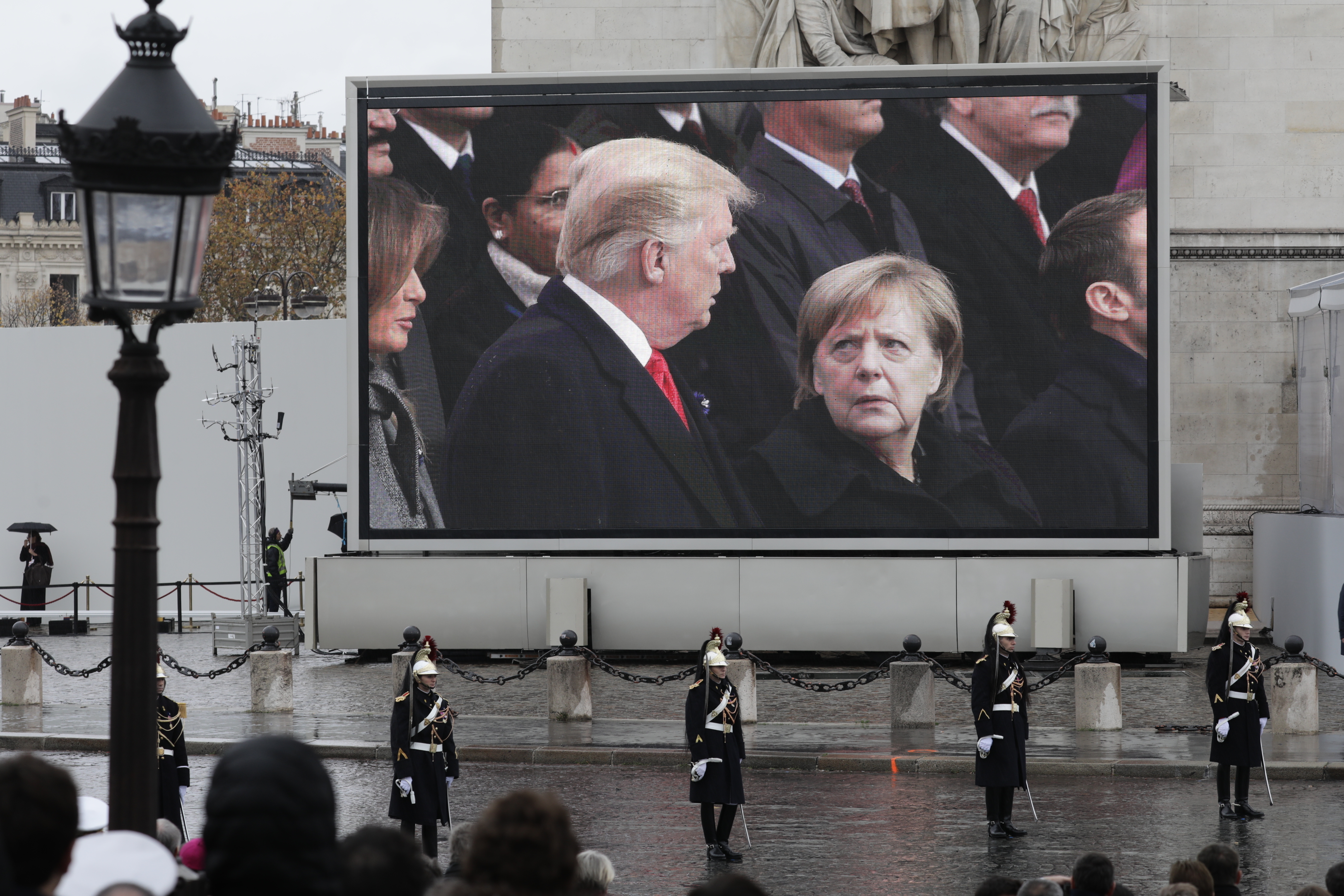 11 November 2018, France (France), Paris: A video screen will show how Chancellor Angela Merkel (r) and Donald Trump, President of the USA, talk. Around 60 heads of state and government are in Paris to commemorate the end of the First World War a hundred years ago. Photo by: Kay Nietfeld/picture-alliance/dpa/AP Images