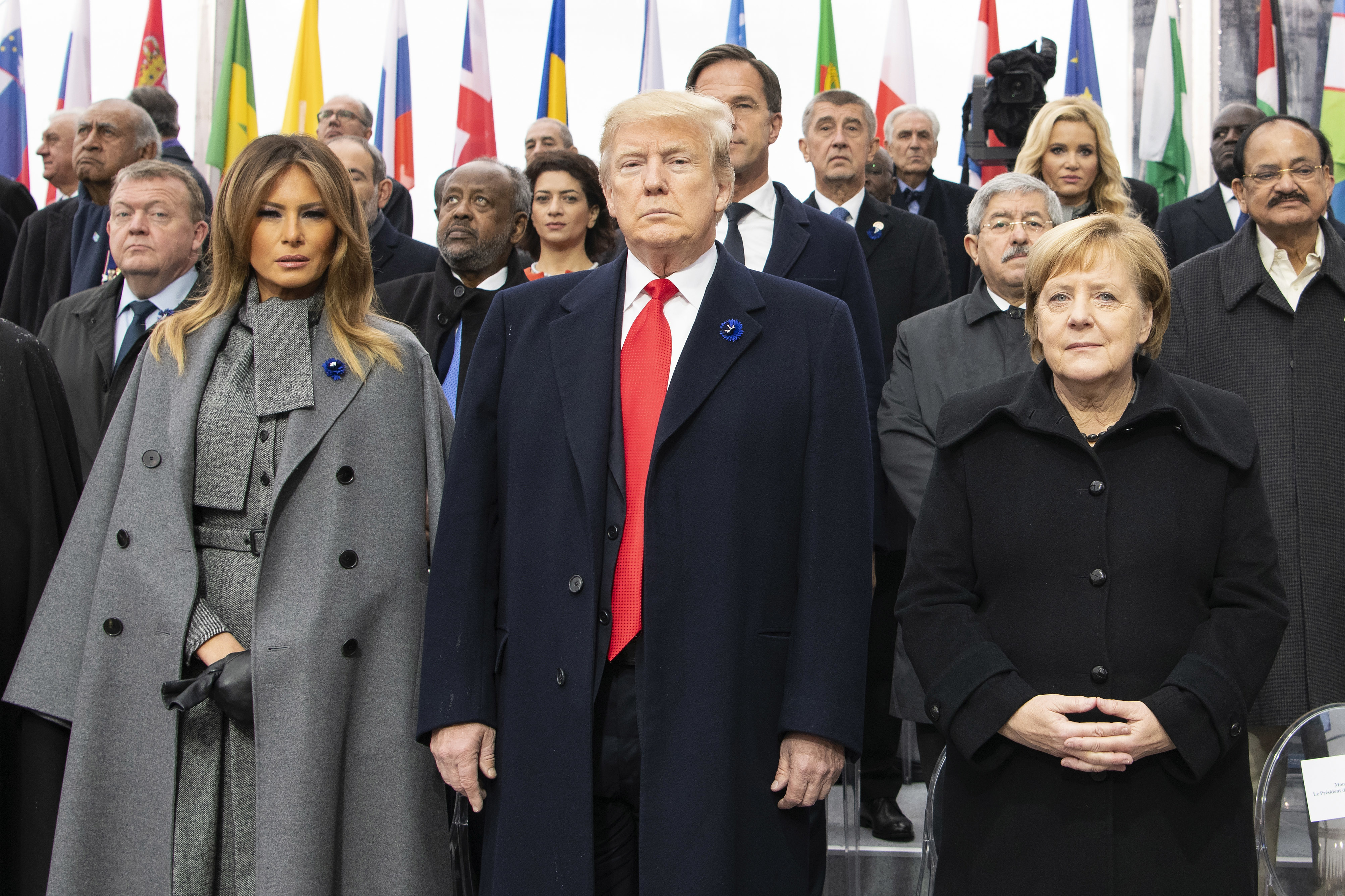 HANDOUT - 11 November 2018, France (France), Paris: Donald Trump (M), President of the USA, First Lady Melania Trump (l) and Chancellor Angela Merkel take part in a commemoration ceremony at the Arc de Triomphe. Around 60 heads of state and government are in Paris to commemorate the end of the First World War a hundred years ago. Photo by: Guido Bergmann/picture-alliance/dpa/AP Images