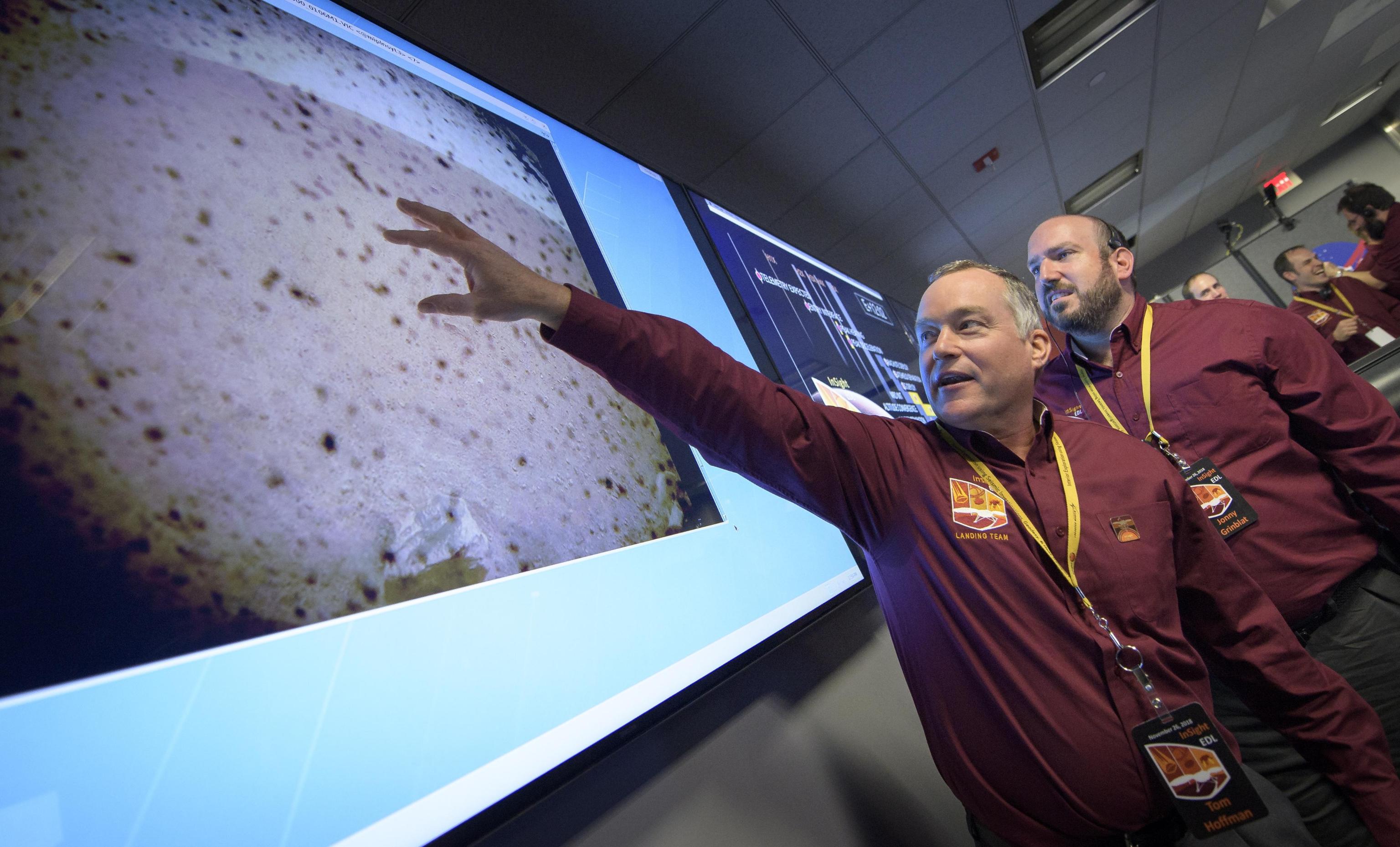 epa07191836 A handout photo made available by NASA shows Tom Hoffman, InSight Project Manager, NASA JPL reacts to the first image to be seen from the Mars InSight lander shortly after confirmation of a successful touch down on the surface of Mars, inside the Mission Support Area at NASA's Jet Propulsion Laboratory in Pasadena, California, USA, 26 November 2018. InSight, short for Interior Exploration using Seismic Investigations, Geodesy and Heat Transport, is a Mars lander designed to study the 'inner space' of Mars: its crust, mantle, and core.  EPA/NASA/Bill Ingalls / HANDOUT MANDATORY CREDIT: (NASA/Bill Ingalls)

AFS 8/101 - Permanent HANDOUT EDITORIAL USE ONLY/NO SALES