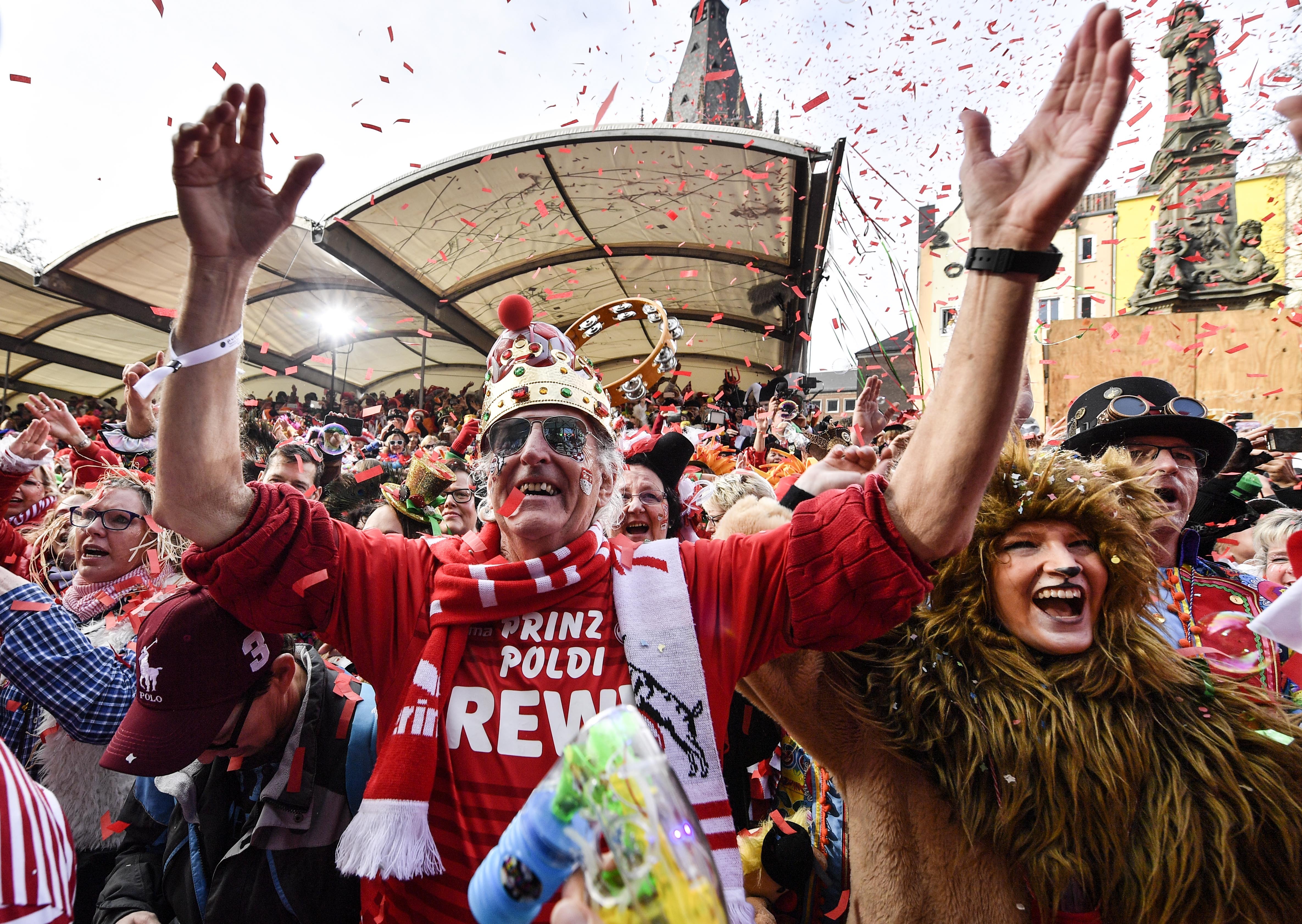 Thousands of revelers dressed in carnival costumes celebrate the start of the street carnival in Cologne, Germany, Thursday, Feb. 28, 2019. (AP Photo/Martin Meissner)