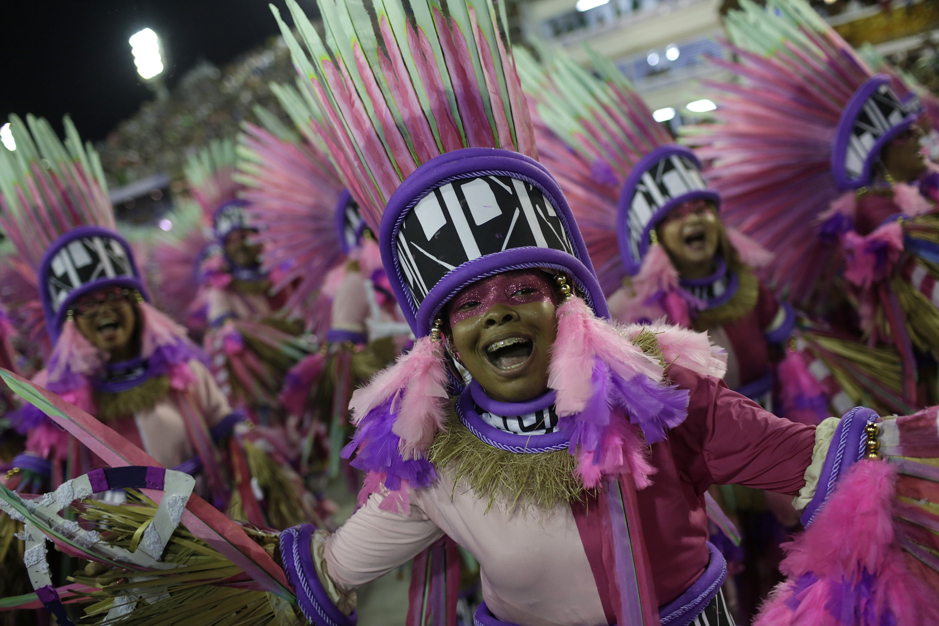 Performers from the Mangueira samba school parade during Carnival celebrations at the Sambadrome in Rio de Janeiro, Brazil, Tuesday, March 5, 2019. (AP Photo/Silvia Izquierdo)