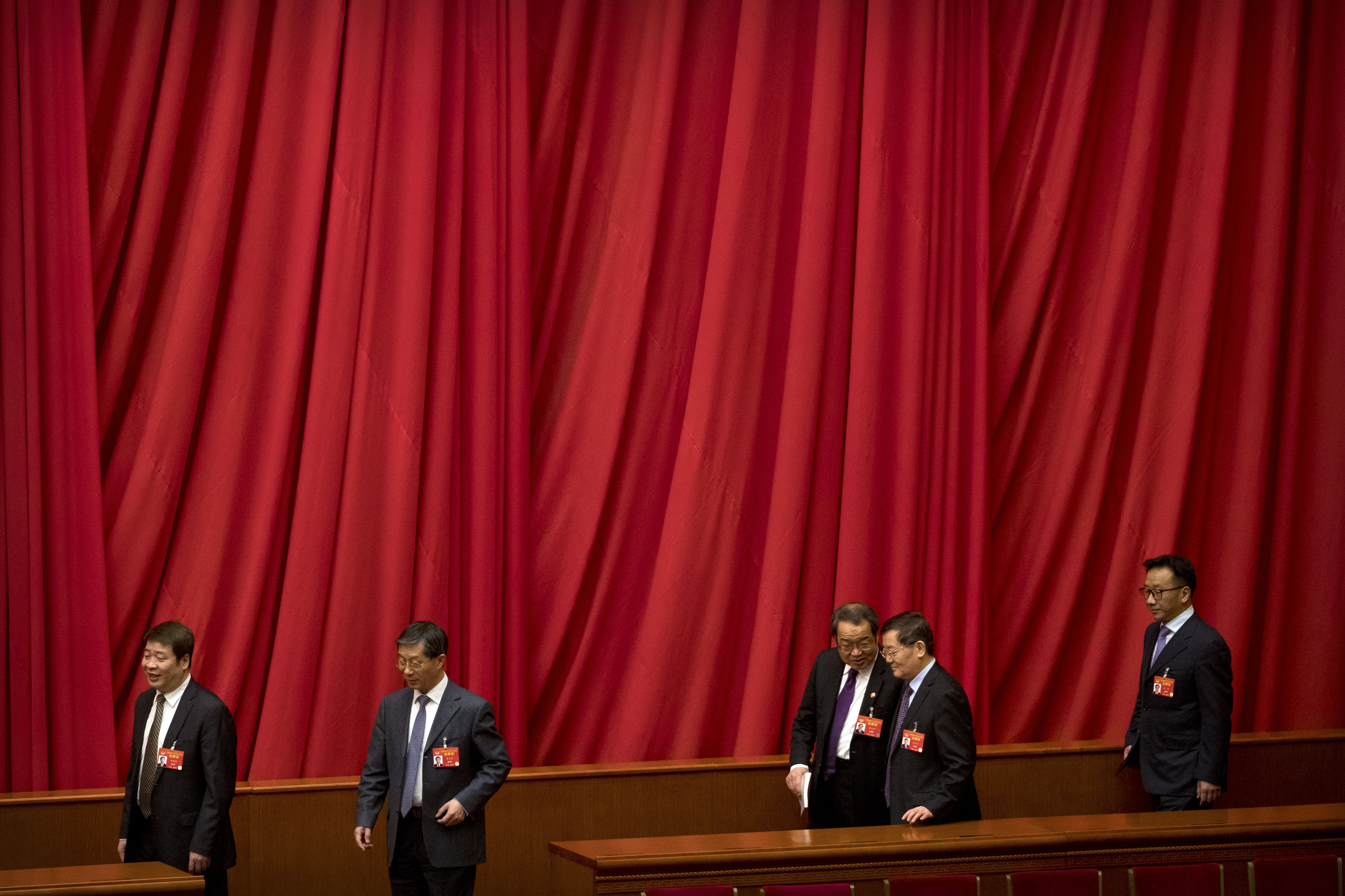 Delegates arrive for the closing session of the Chinese People's Political Consultative Conference (CPPCC) at the Great Hall of the People in Beijing, Wednesday, March 13, 2019. (AP Photo/Mark Schiefelbein)