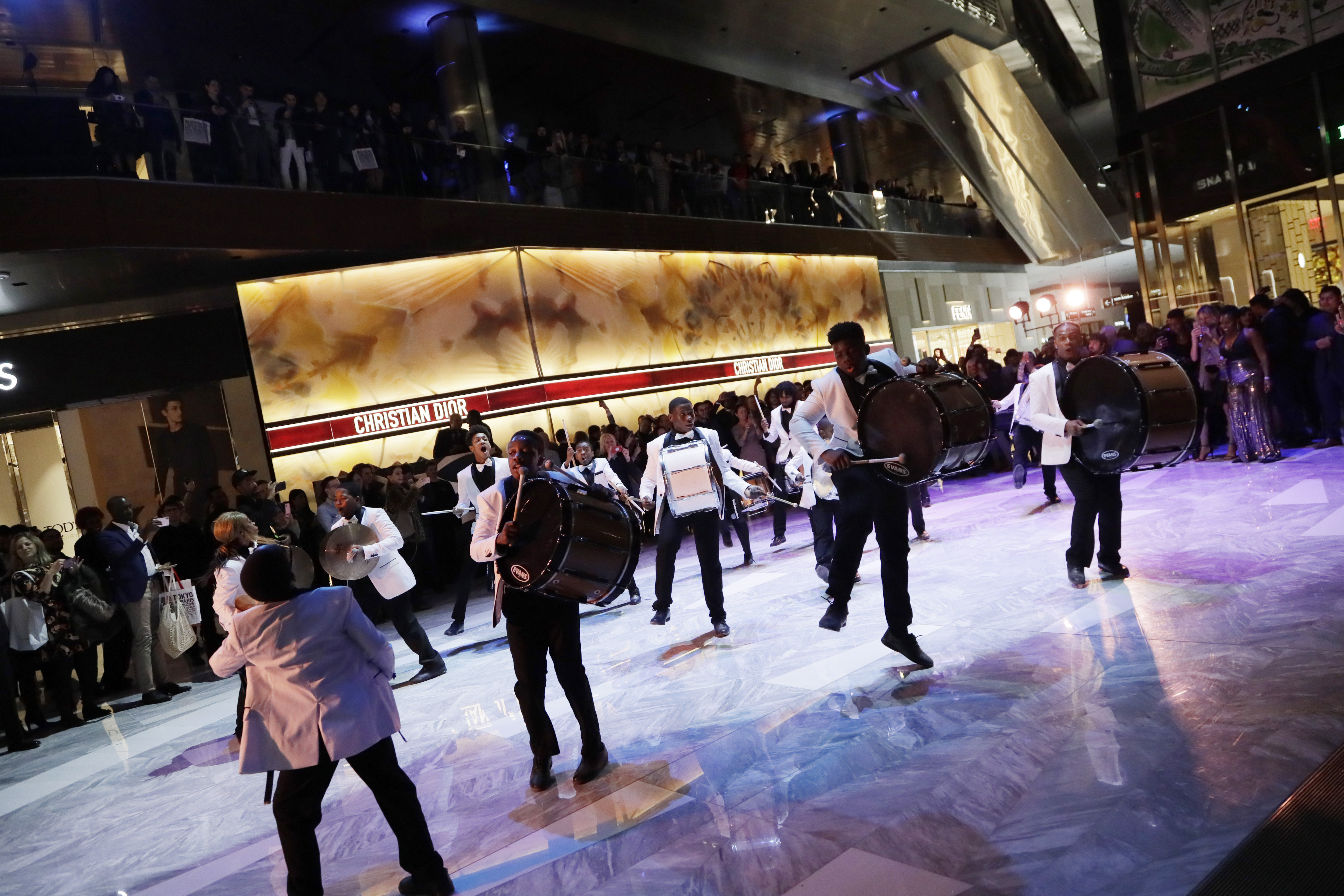 The United Marching Band performs for the opening night of The Shops & Restaurants at Hudson Yards, Thursday, March 14, 2019, in New York. Hudson Yards, a $25 billion urban complex on Manhattan's west side, is the city's most ambitious development since the rebuilding of the World Trade Center. When fully complete, the 28-acre site will include 16 towers of homes and offices, a hotel, a school, the highest outdoor observation deck in the Western Hemisphere, a performing arts center and the shopping mall. (AP Photo/Mark Lennihan)