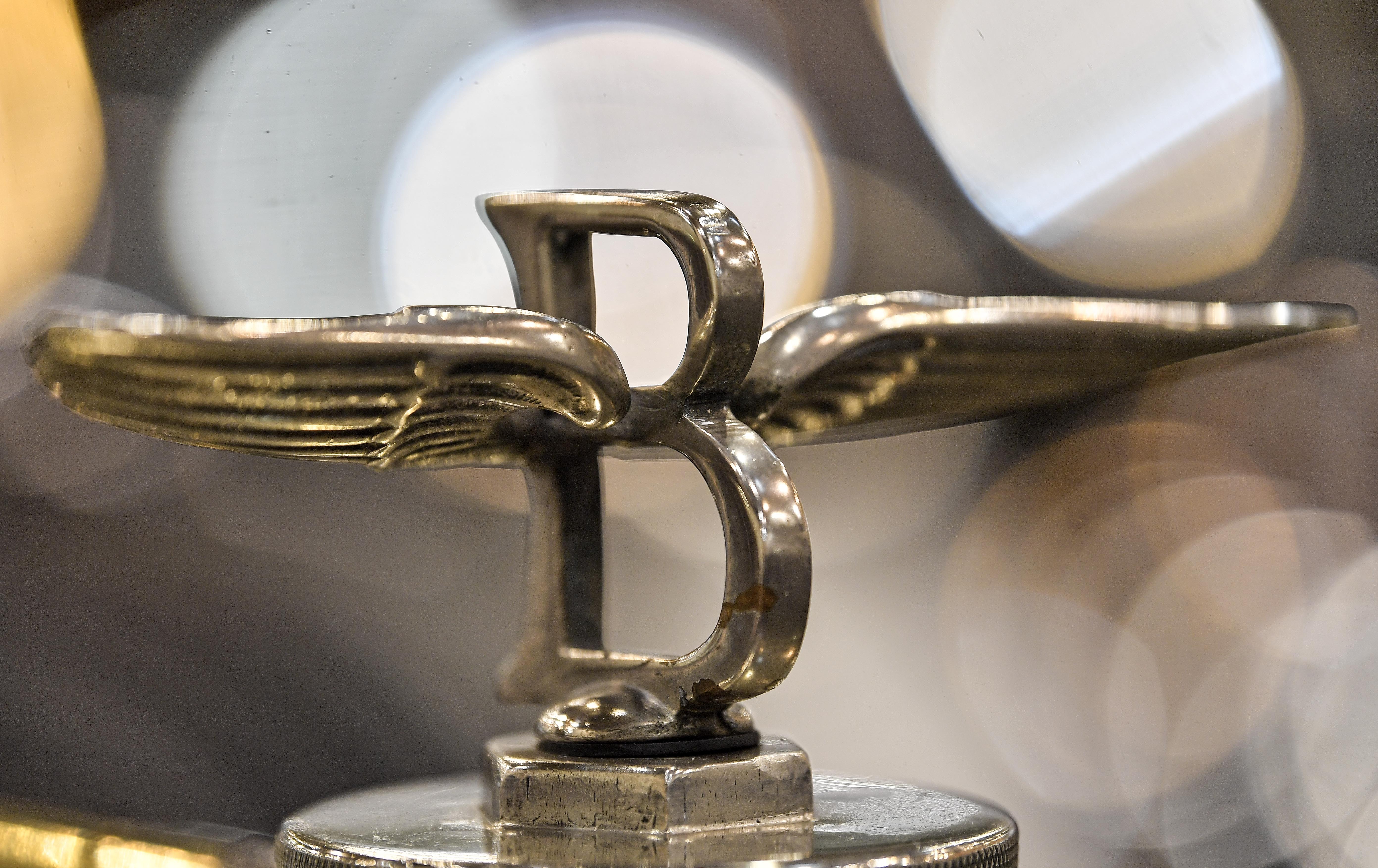 The hood ornament of a vintage Bentley car is seen at the World Show for Vintage, Classic and Prestige Automobiles Techno-Classica in Essen, Germany, Friday, April 12, 2019. (AP Photo/Martin Meissner)