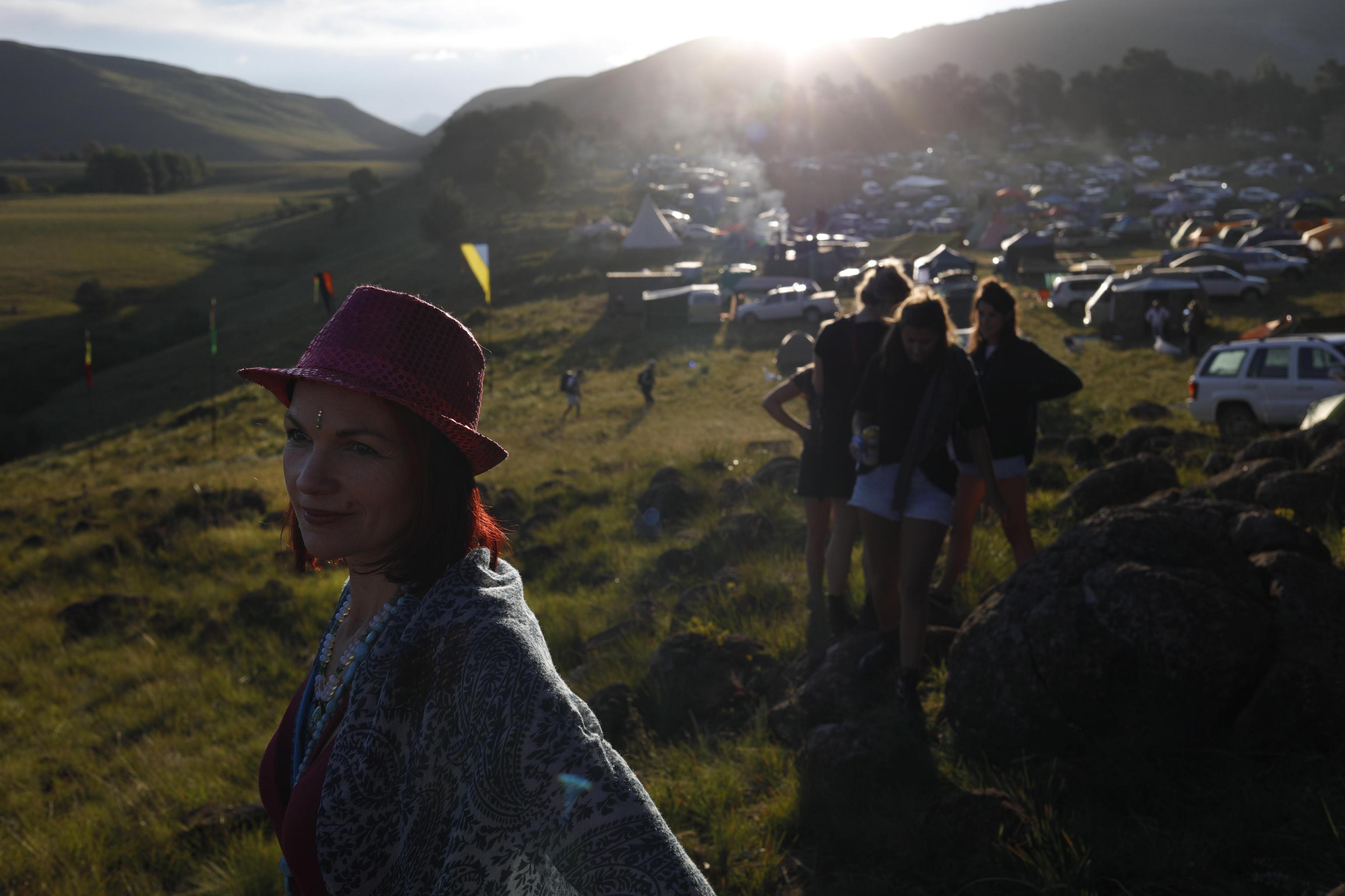 epa07514447 Festival goers during the annual Splashy Fen music festival in Underberg, South Africa, 18 April 2019. The five day long festival is the oldest in the country and is celebrating its 30 year. The festival has four stages with various music styles, morning yoga sessions, artworks, trail running, holistic lifestyle events, stalls etc.  EPA/KIM LUDBROOK