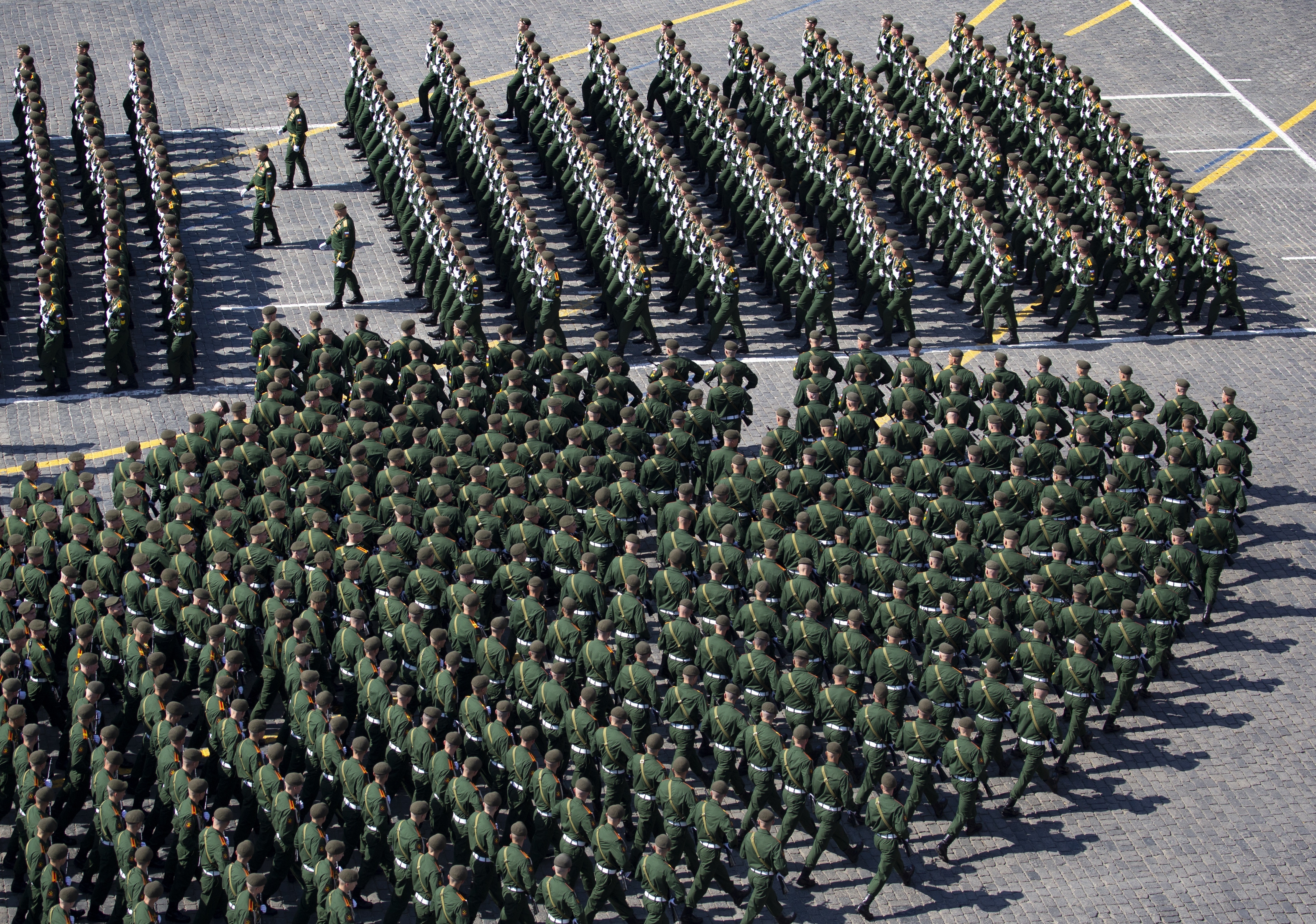 Russian troops march during a rehearsal for the Victory Day military parade in Red Square in Moscow, Russia, Tuesday, May 7, 2019. The parade will take place at Moscow's Red Square on May 9 to celebrate 74 years of the victory in WWII. (AP Photo/Alexander Zemlianichenko, Pool)