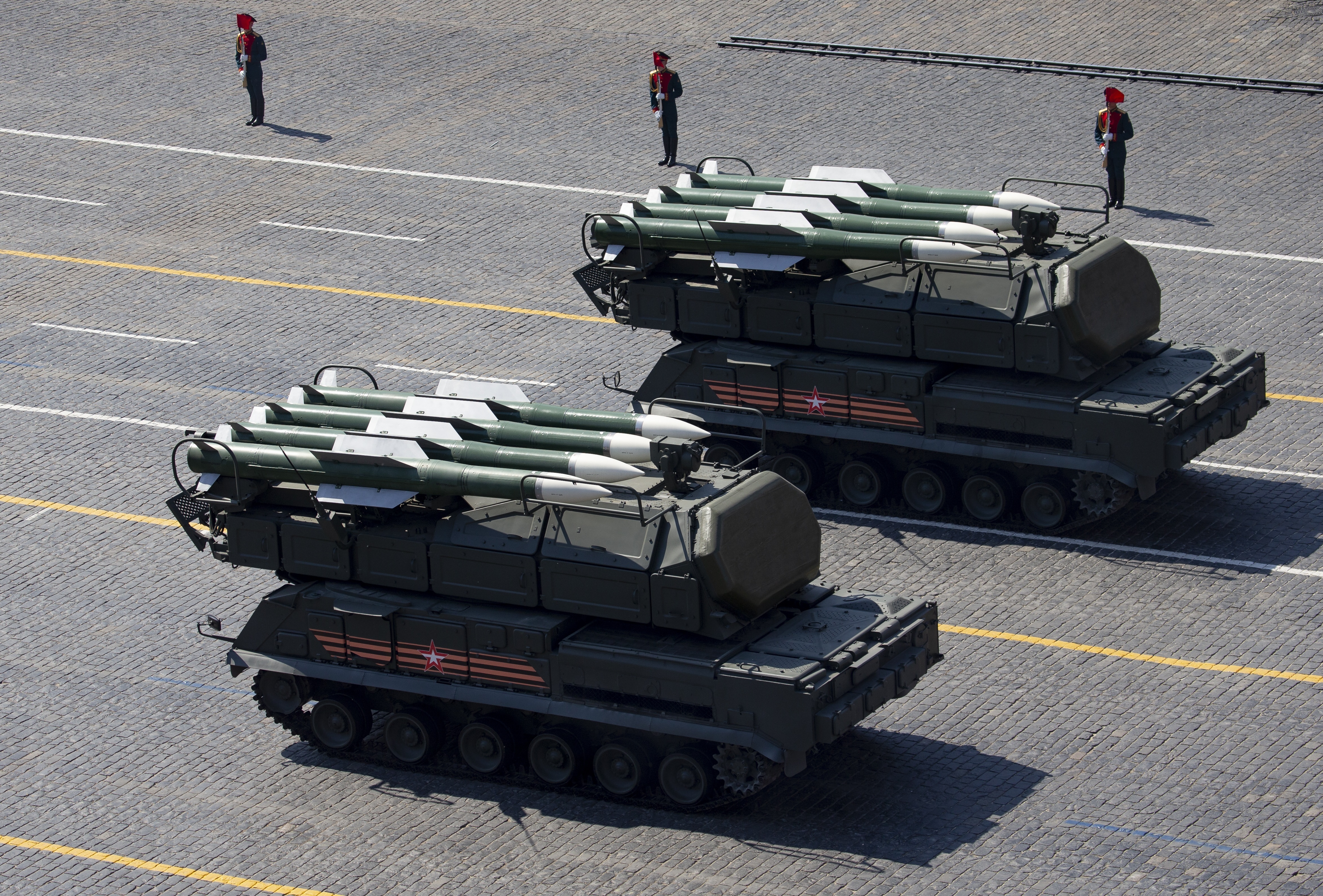 Russian Buk-M2 air defense missile systems drive down Red Square during a rehearsal for the Victory Day military parade in Moscow, Russia, Tuesday, May 7, 2019 . The parade will take place at Moscow's Red Square on May 9 to celebrate 74 years of the victory in WWII. (AP Photo/Alexander Zemlianichenko, Pool)