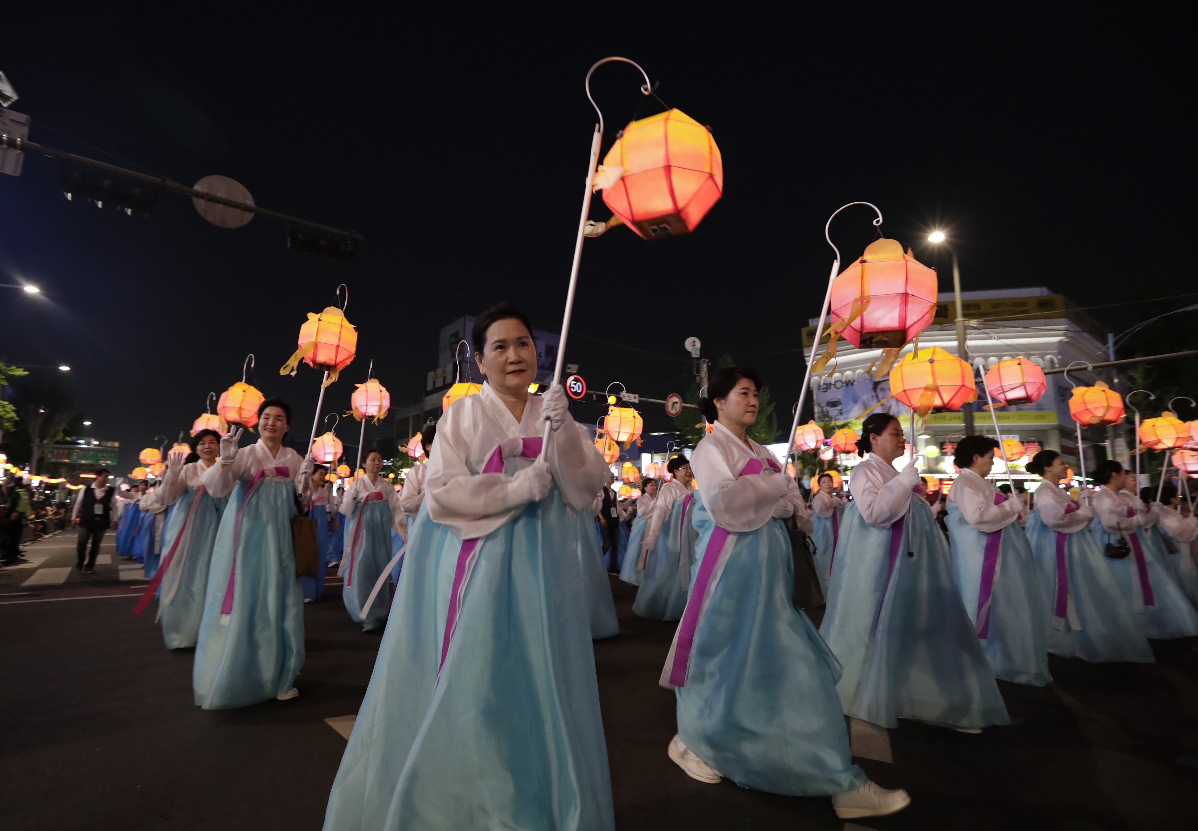 Buddhists carry lanterns in a parade during the Lotus Lantern Festival to celebrate the upcoming birthday of Buddha on May 12, in Seoul, South Korea, Saturday, May 4, 2019. (AP Photo/Lee Jin-man)