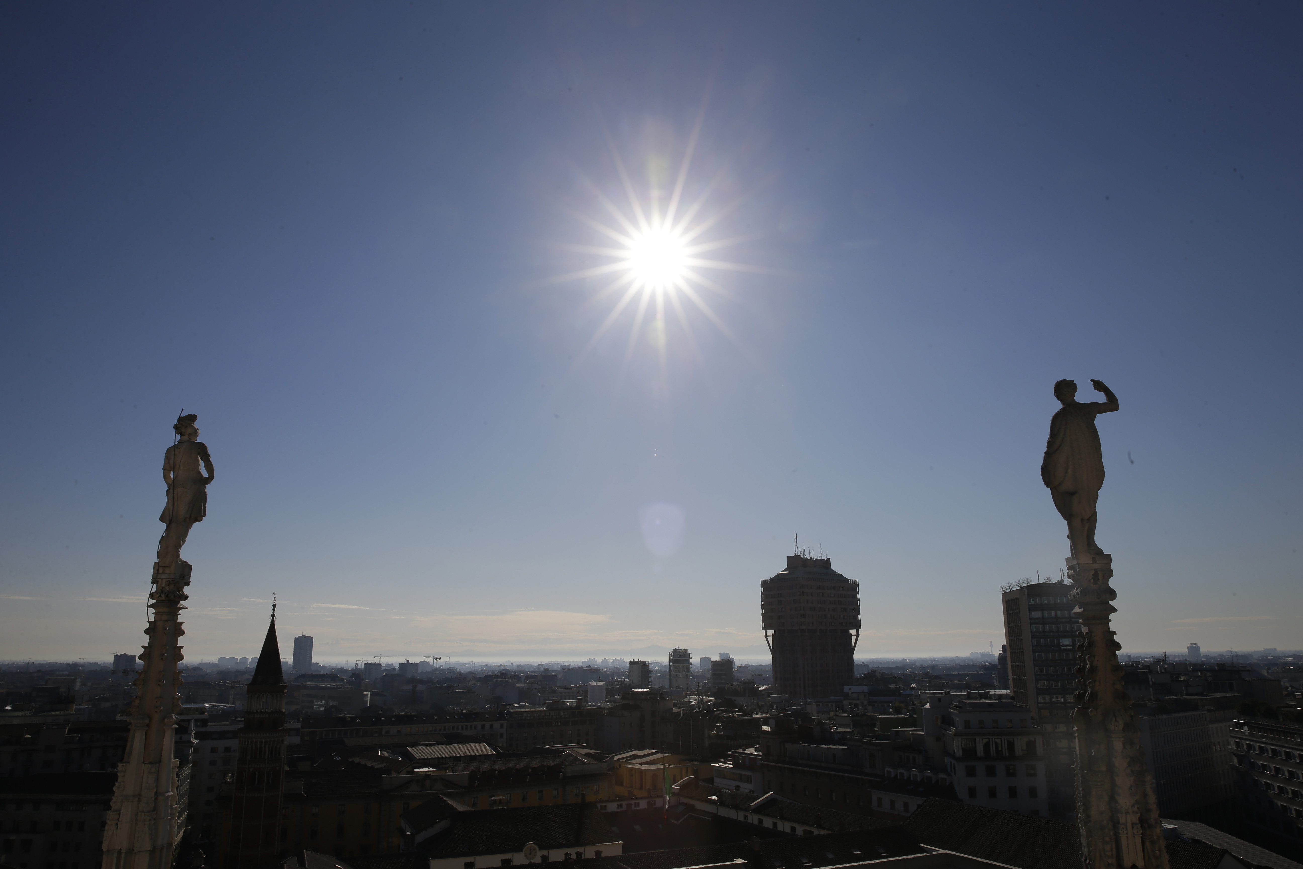 A skyline of Milan, Italy, as seen from the Duomo gothic cathedral, Sunday Jan. 25, 2015. (AP Photo/Luca Bruno)