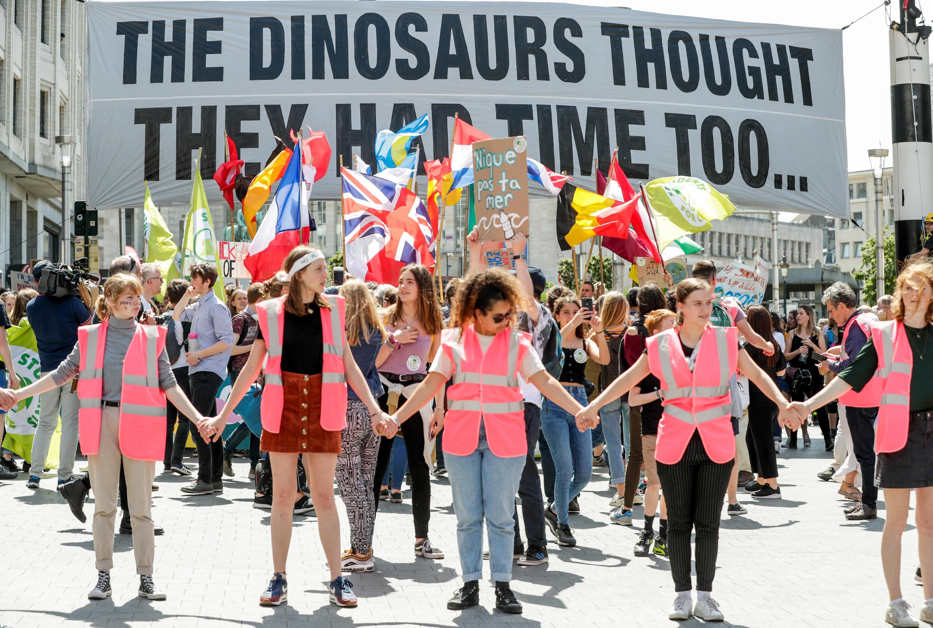 epa07597178 People take part in a demonstration called 'Global Strike for Climate 2' in Brussels, Belgium, 24 May 2019. Youth and students across the world are taking part in a student strike movement called #FridayForFuture which was sparked by Greta Thunberg of Sweden, a sixteen year old climate activist who has been protesting outside the Swedish parliament every Friday since August 2018.  EPA/STEPHANIE LECOCQ