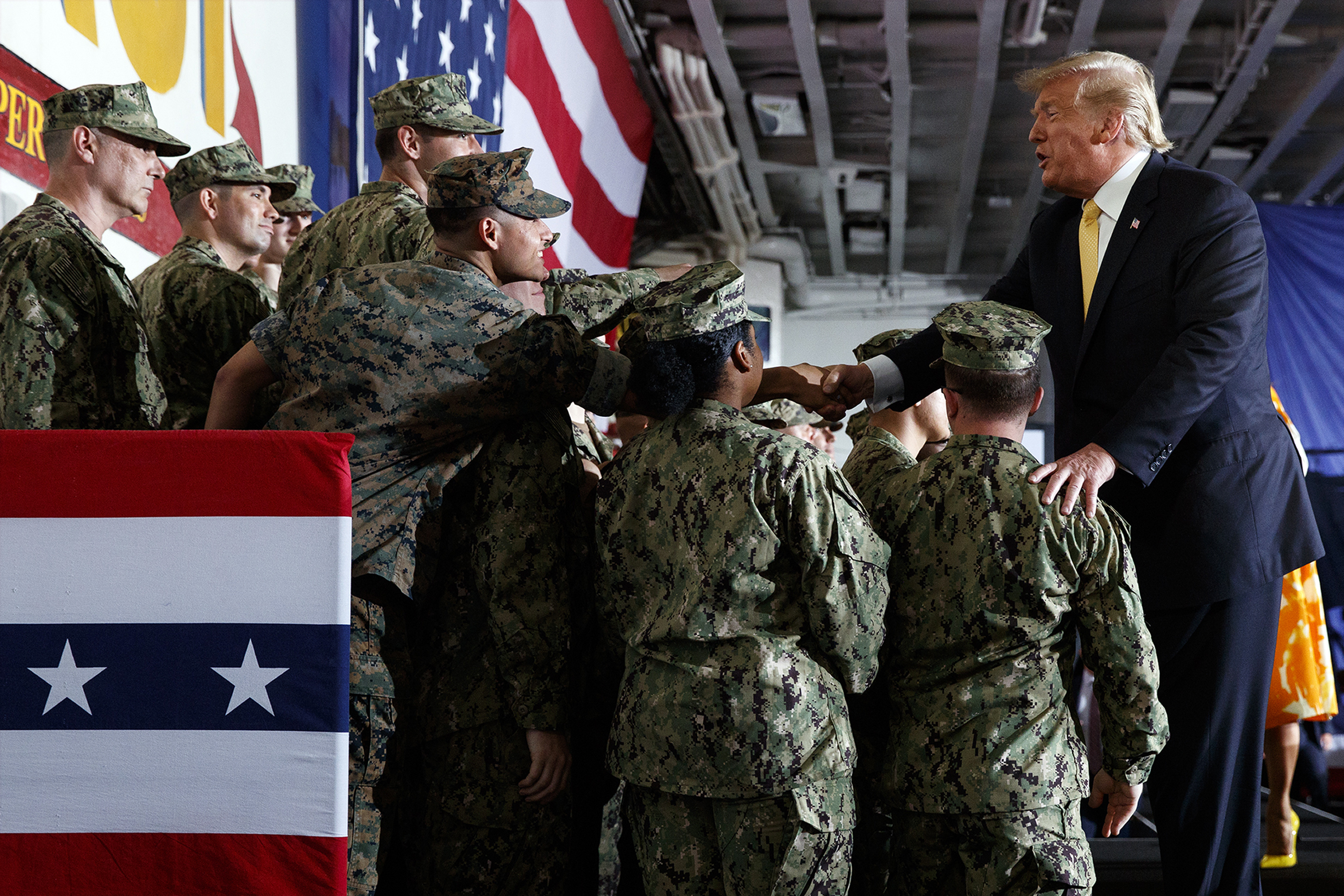 President Donald Trump greets troops after speaking at a Memorial Day event aboard the USS Wasp, Tuesday, May 28, 2019, in Yokosuka, Japan. (AP Photo/Evan Vucci)
