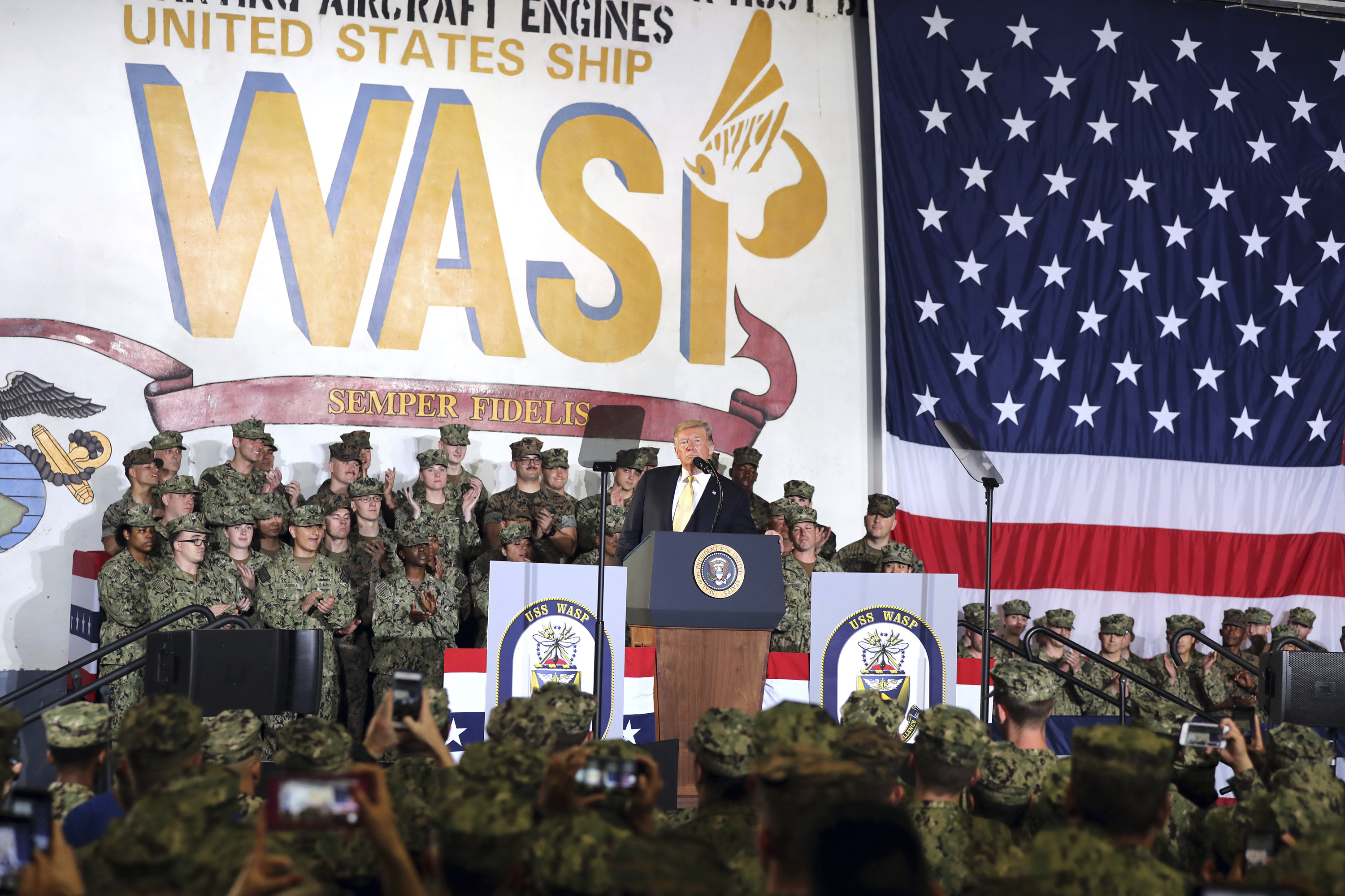 U.S. President Donald Trump speaks to U.S. servicemen at U.S. Navy multipurpose amphibious assault ship USS Wasp at the U.S. Navy's Yokosuka base in Yokosuka, south of Tokyo Tuesday, May 28, 2019. (AP Photo/Eugene Hoshiko)
