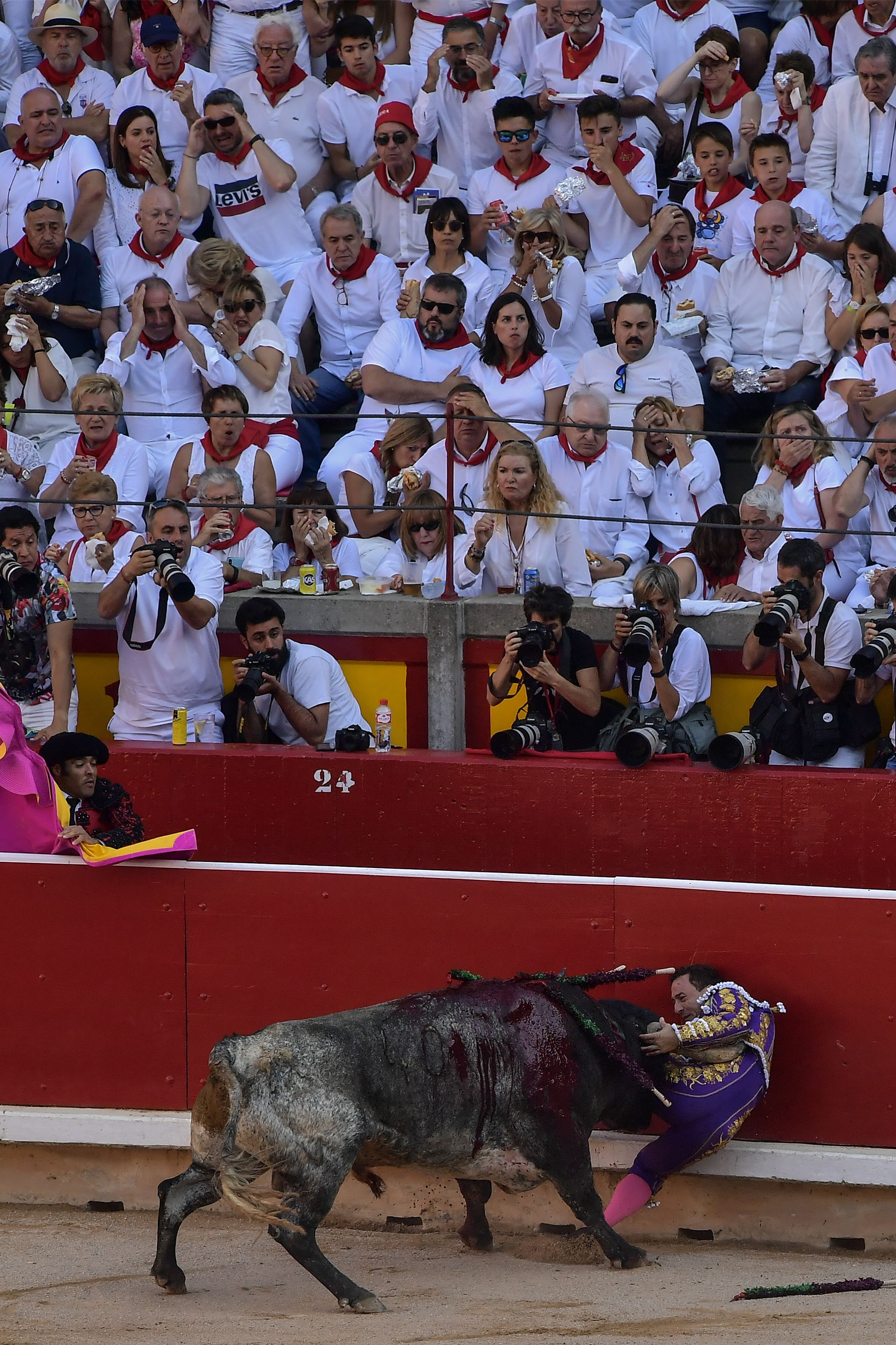 Spanish bullfighter Rafaelillo during a bullfight at the San Fermin Festival in Pamplona, northern Spain, Sunday, July 14, 2018. Revellers from around the world flock to Pamplona every year to take part in the eight days of the running of the bulls. (AP Photo/Alvaro Barrientos)