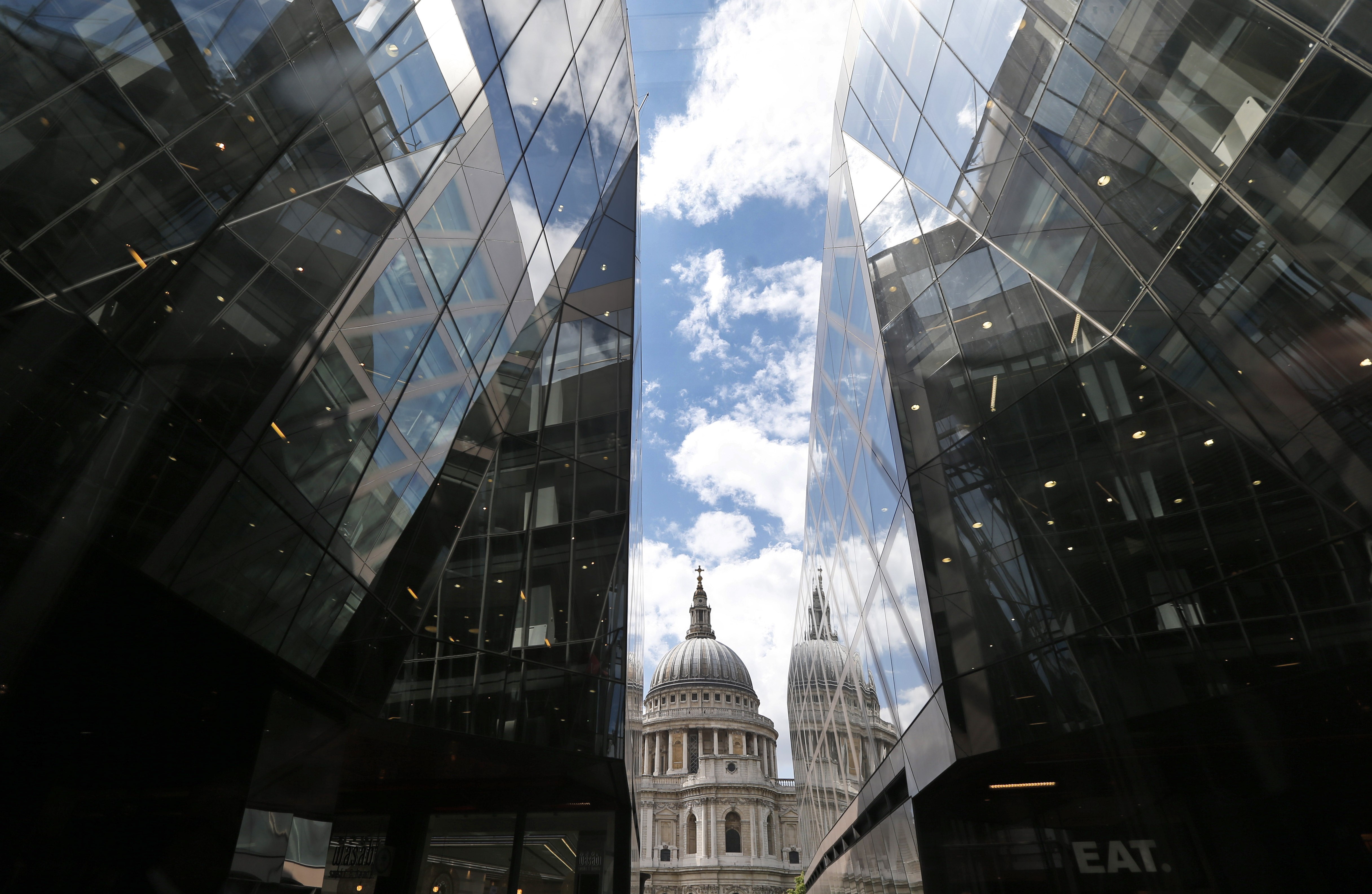 A view of St. Paul's Cathedral in central London, from within a shopping centre, Thursday, June 5, 2014.(AP Photo/Lefteris Pitarakis)