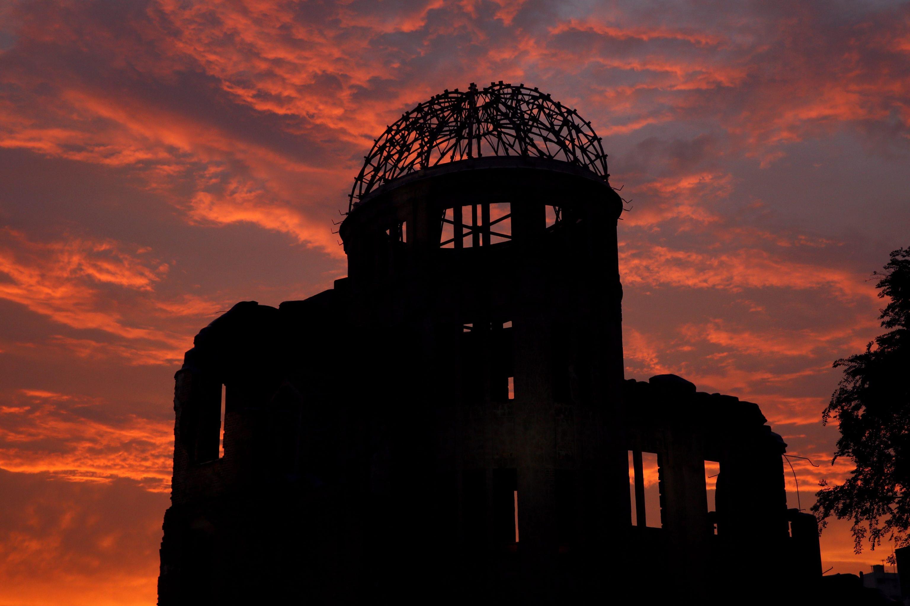 epa03813826 The Atomic Bomb Dome during dusk at Peace Memorial Park in Hiroshima, western Japan, 05 August 2013. Hiroshima will mark the 68th anniversary of the world's first atomic bombing in 1945 on 06 August.  EPA/KIMIMASA MAYAMA