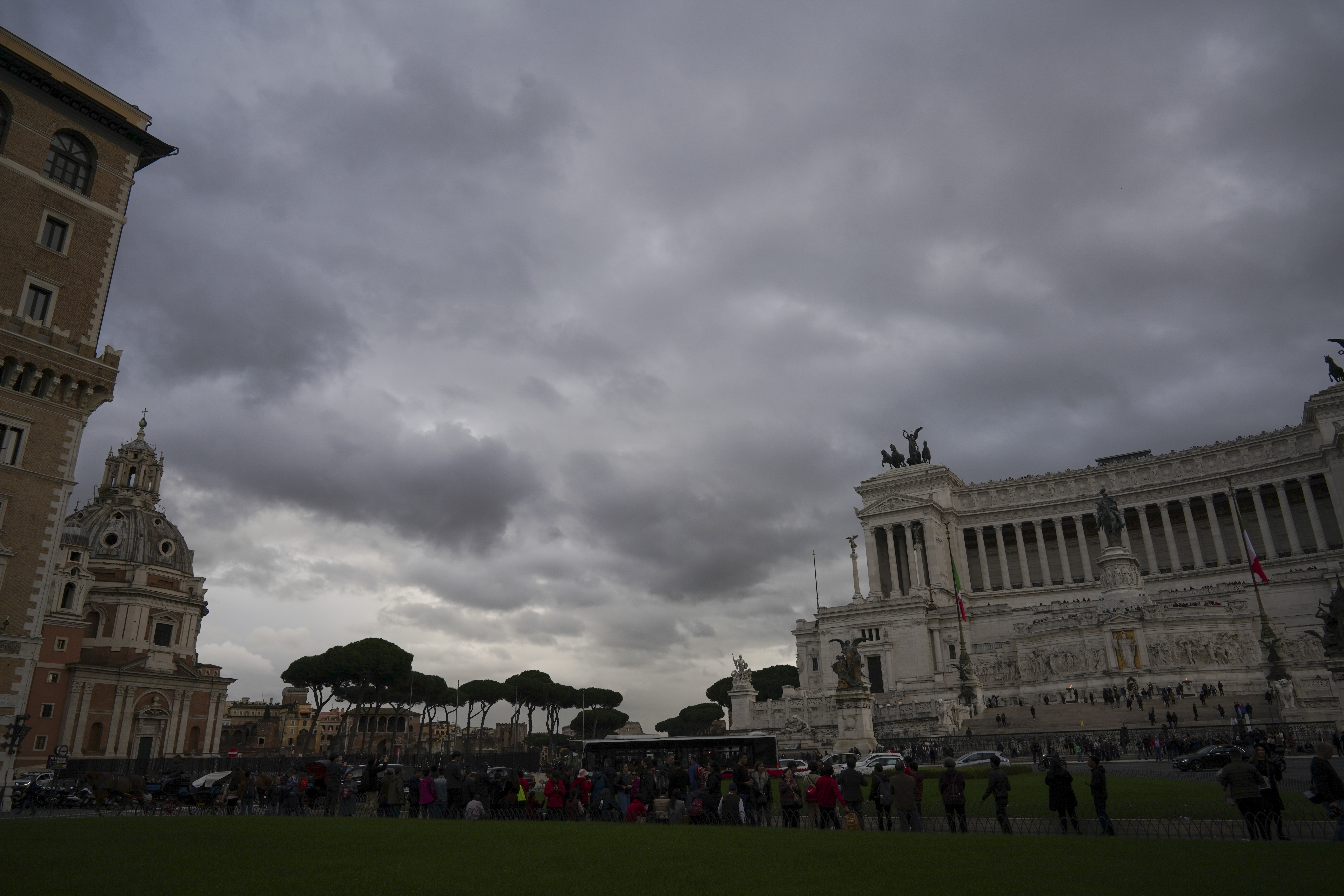 Storm clouds gather over Rome central Piazza Venezia, Thursday, Nov. 14, 2019. (AP Photo/Andrew Medichini)