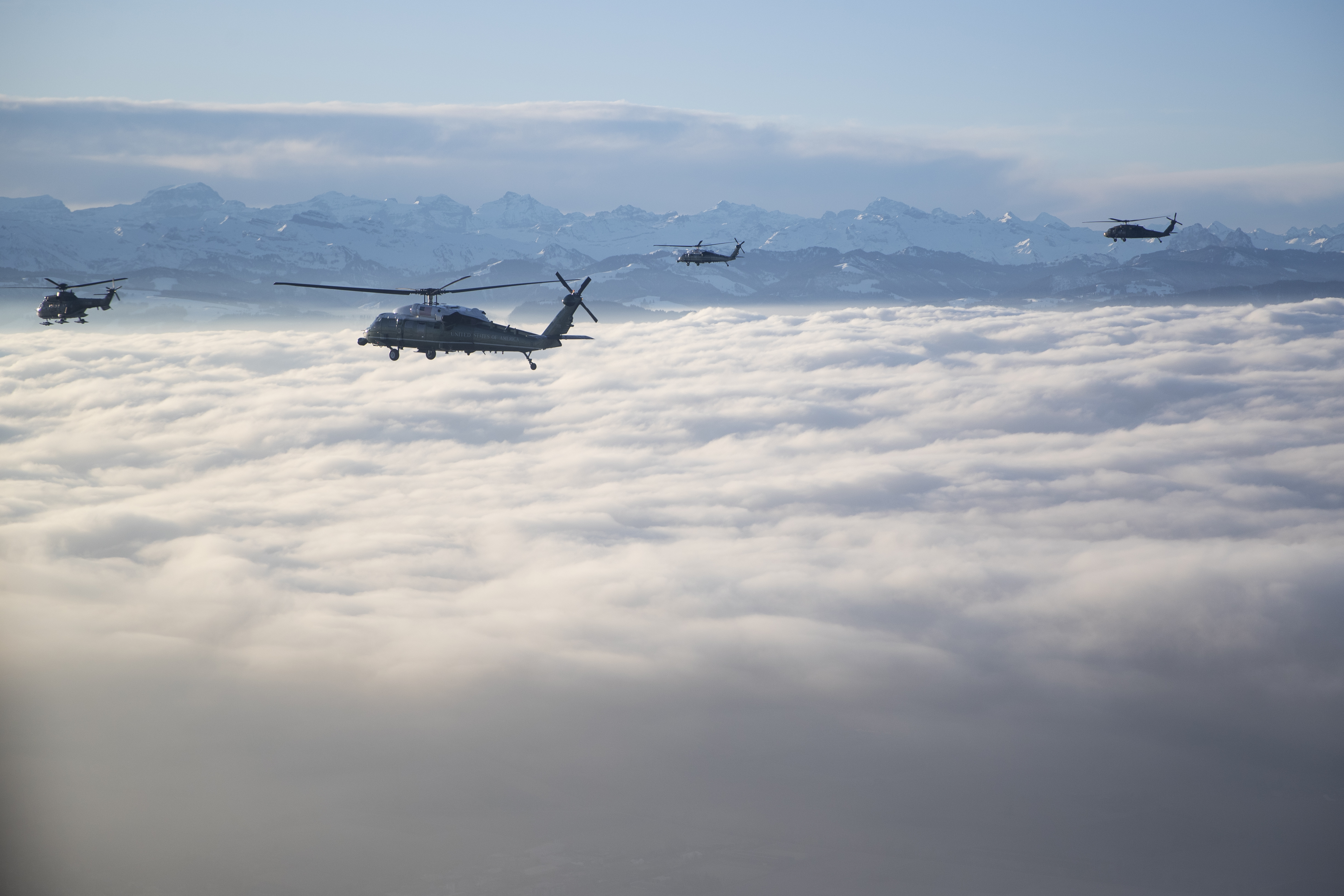 Marine One carrying US President Donald Trump travels to the Davos landing zone in Switzerland, Tuesday, Jan. 21, 2020. President Trump arrived in Switzerland on Tuesday to start a two-day visit to the World Economic Forum. (AP Photo/Evan Vucci)