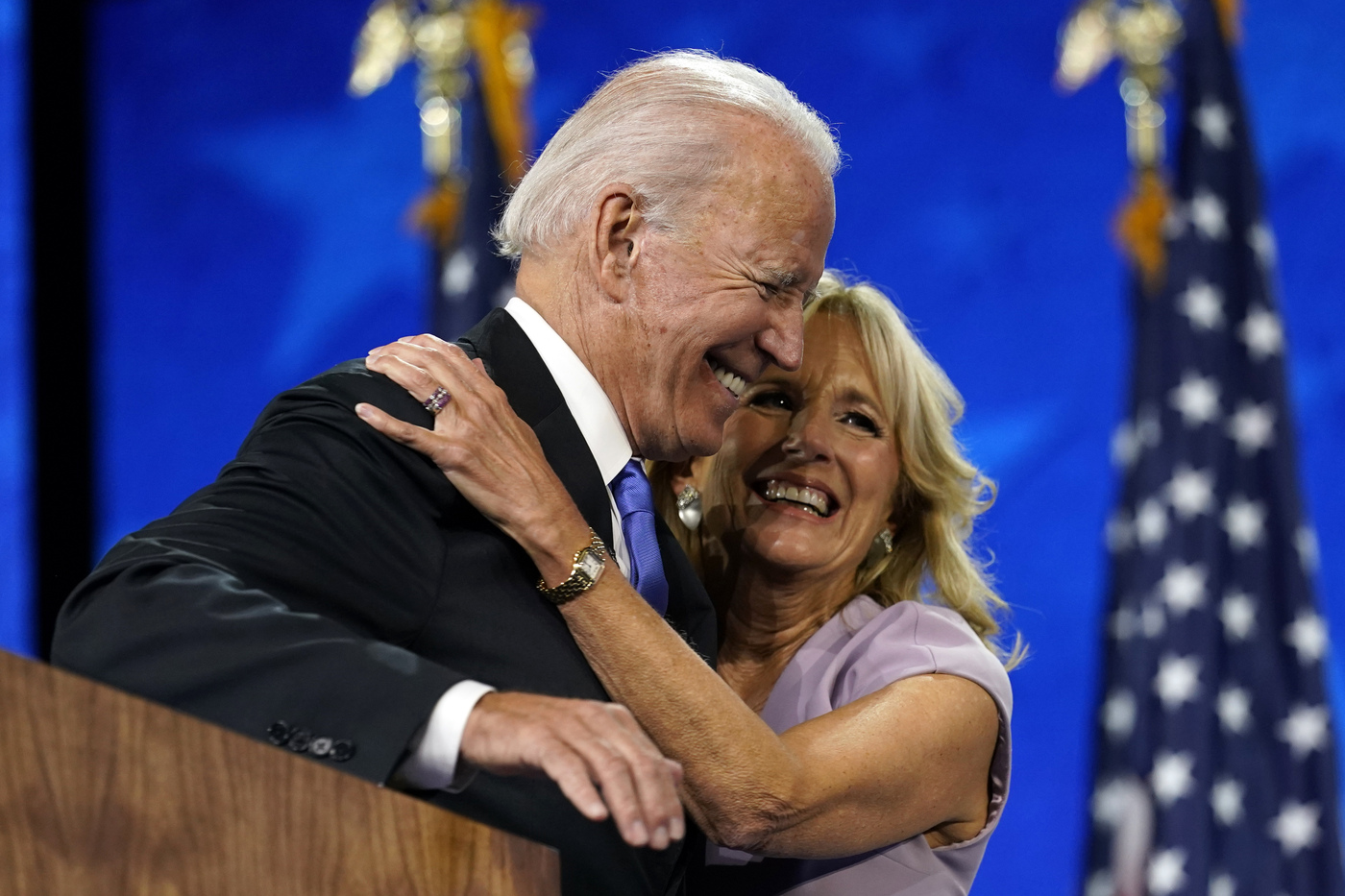 FILE - In this Aug. 20, 2020, file photo Democratic presidential candidate former Vice President Joe Biden hugs his wife Jill Biden after his speech during the fourth day of the Democratic National Convention at the Chase Center in Wilmington, Del. (AP Photo/Andrew Harnik, File)