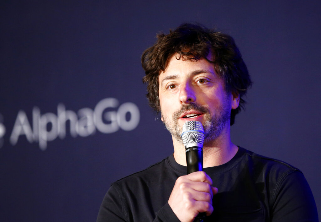 FILE- In this March 12, 2016, file photo Google co-founder Sergey Brin speaks during a press conference after finishing the third match of the Google DeepMind Challenge Match in Seoul, South Korea. Google co-founders Larry Page and Brin are stepping down from their roles within the parent company, Alphabet. Page, who had been serving as CEO of Alphabet, and Brin, who had been president of Alphabet, will remain on the board of the company. (AP Photo/Lee Jin-man, File)