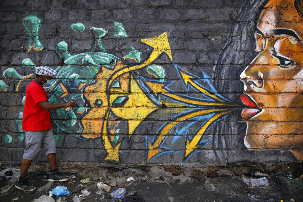 Graffiti artist Elegwa Wycliffe, known as 
