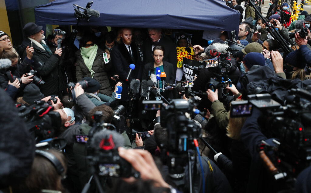 Stella Moris girlfriend of Julian Assange speaks to the media after a ruling that he cannot be extradited to the United States, outside the Old Bailey in London, Monday, Jan. 4, 2021. A British judge has rejected the United States' request to extradite WikiLeaks founder Julian Assange to face espionage charges, saying it would be 