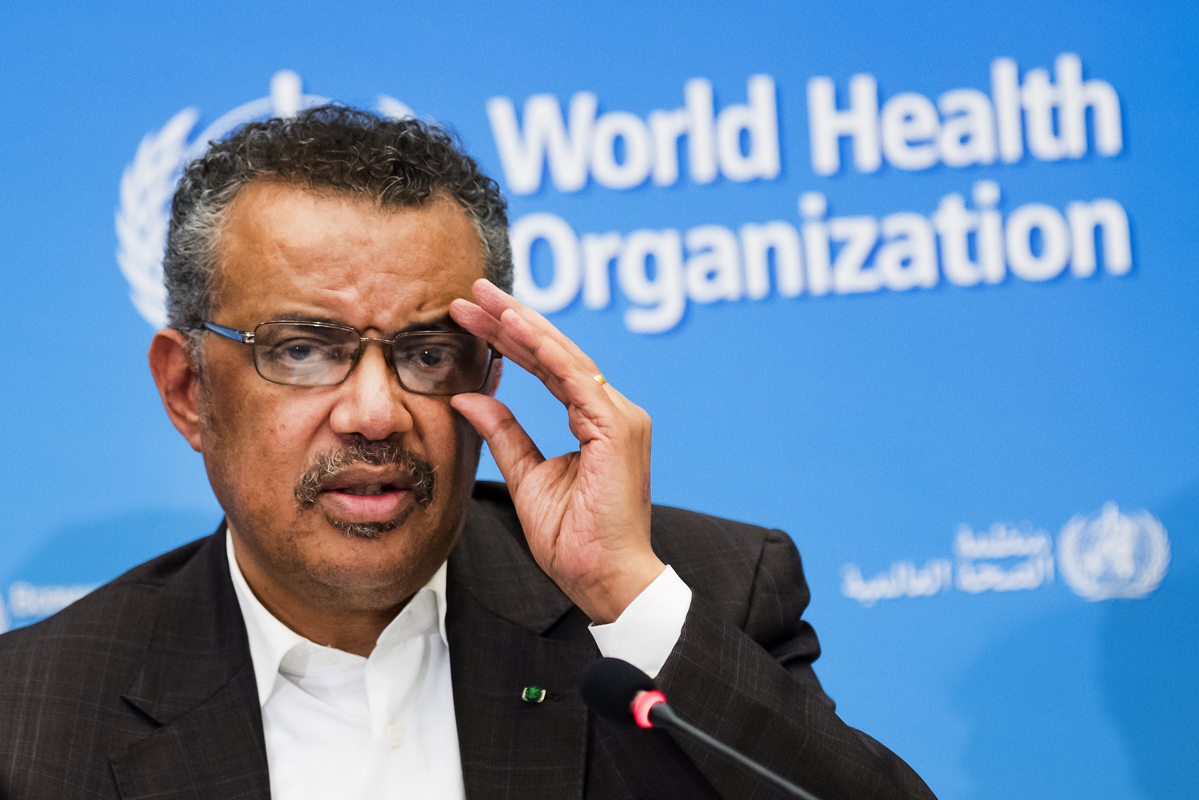 FILE- In this Jan. 30, 2020, file photo, Tedros Adhanom Ghebreyesus, Director General of the World Health Organization (WHO), talks to the media at the World Health Organization headquarters in Geneva, Switzerland. China said Monday, Jan. 11, 2021, that a group of experts from the World Health Organization are due to arrive this week for an investigation into the origins of the coronavirus pandemic. (Jean-Christophe Bott/Keystone via AP, File)