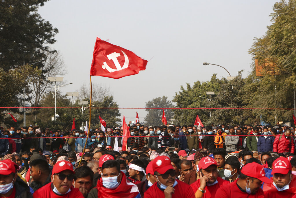 Nepalese supporters of the splinter group in the governing Nepal Communist Party participate in a protest in Kathmandu, Nepal, Friday, Jan. 22, 2021. Thousands of demonstrators rallied in Nepal’s capital Friday protesting against the prime minister who had dissolved the parliament and ordered fresh election because of feuds within the ruling political party. (AP Photo/Niranjan Shrestha)