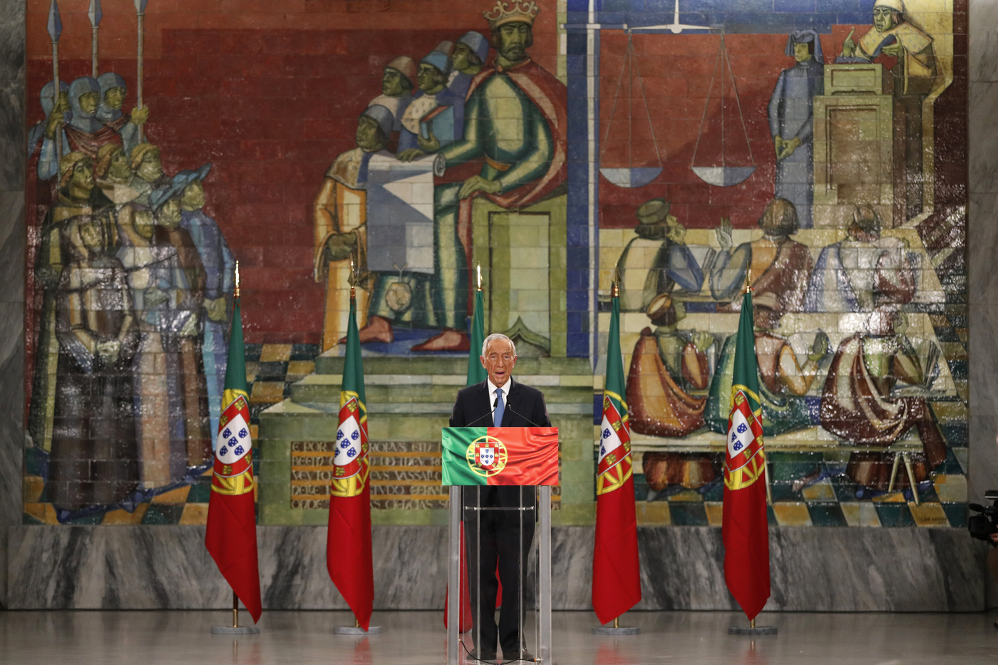 Incumbent Marcelo Rebelo de Sousa delivers a speech following the results of Portugal's presidential election, in Lisbon, Sunday, Jan. 24, 2021. Rebelo de Sousa was reelected for a second five-year term. (AP Photo/Armando Franca)