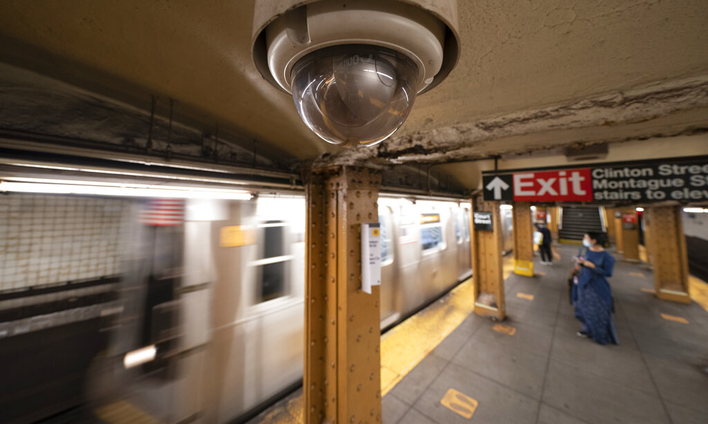 A video surveillance camera is installed on the ceiling above a subway platform in the Court Street station, Wednesday, Oct. 7, 2020 in the Brooklyn borough of New York. (AP Photo/Mark Lennihan)